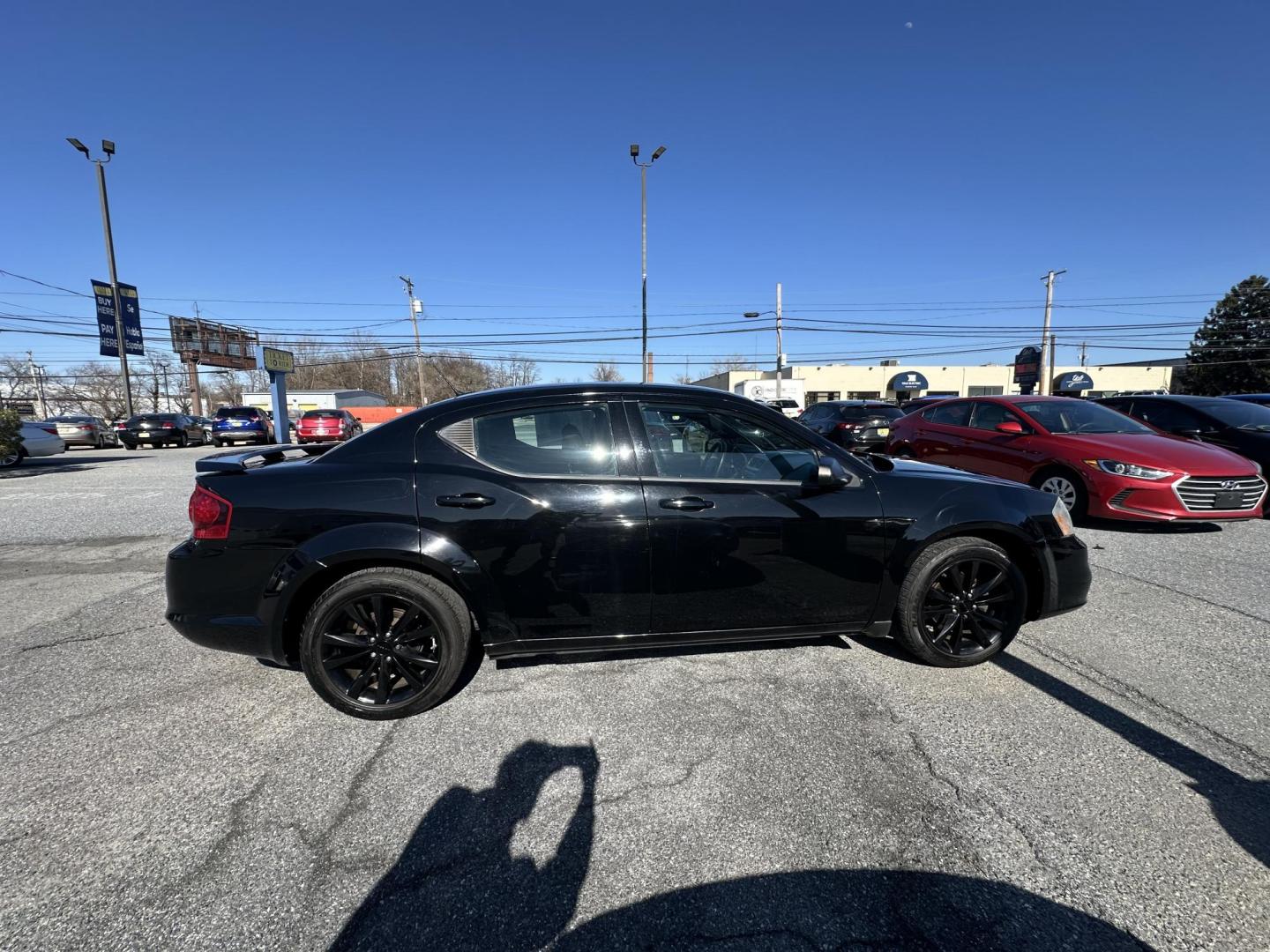 2014 BLACK Dodge Avenger SE (1C3CDZAB1EN) with an 2.4L L4 DOHC 16V engine, 4-Speed Automatic transmission, located at 1254 Manheim Pike, Lancaster, PA, 17601, (717) 393-9133, 40.062870, -76.323273 - Photo#2