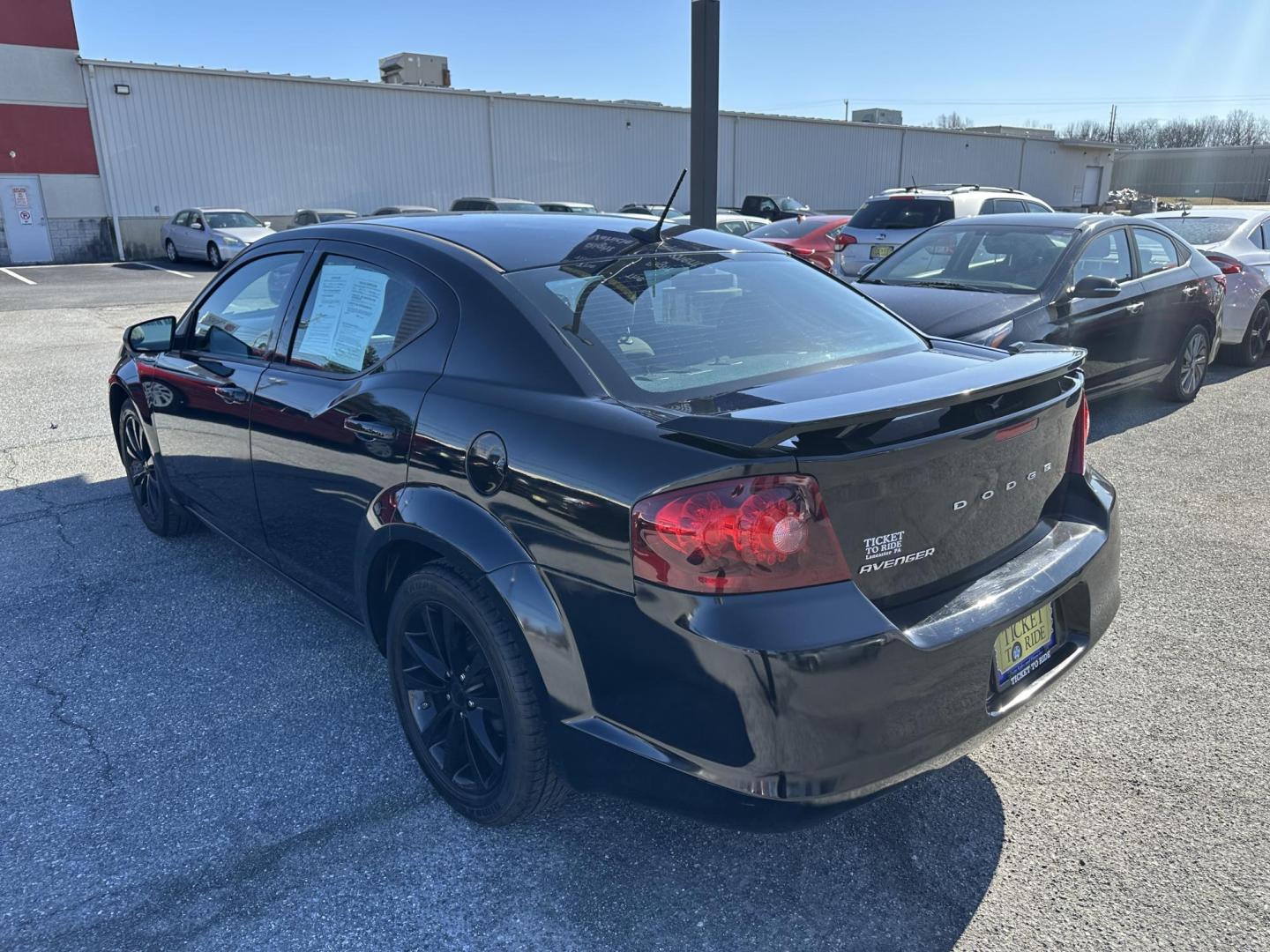 2014 BLACK Dodge Avenger SE (1C3CDZAB1EN) with an 2.4L L4 DOHC 16V engine, 4-Speed Automatic transmission, located at 1254 Manheim Pike, Lancaster, PA, 17601, (717) 393-9133, 40.062870, -76.323273 - Photo#5