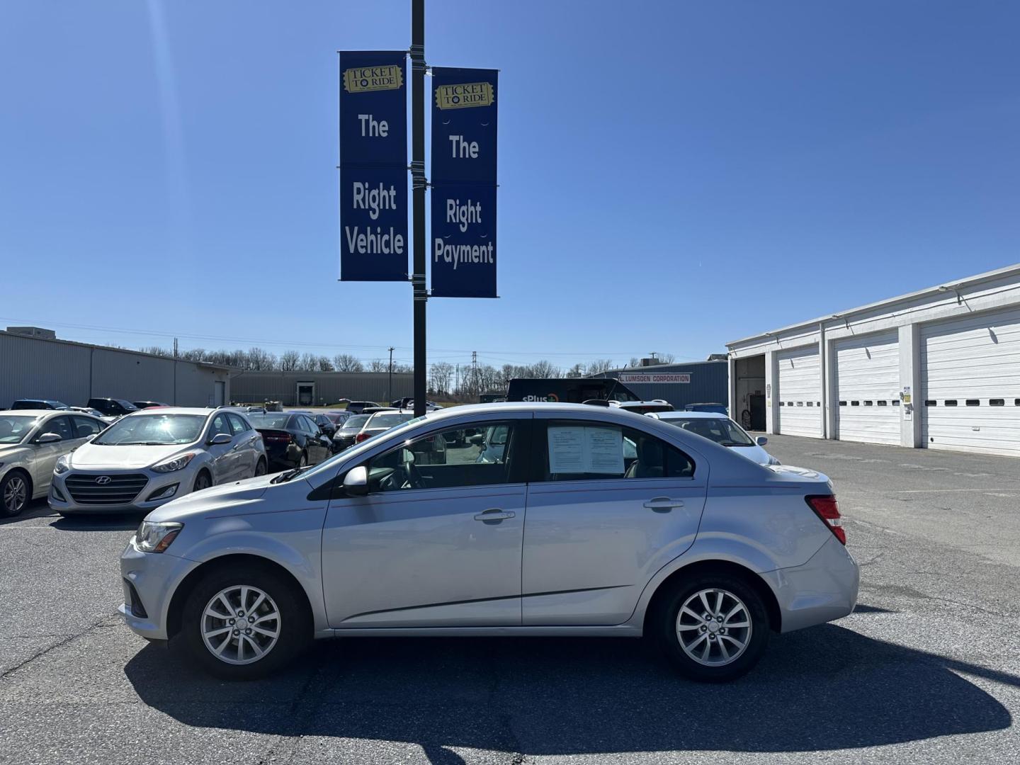 2017 SILVER Chevrolet Sonic LT Manual Sedan (1G1JD5SH5H4) with an 1.8L L4 DOHC 24V engine, 5M transmission, located at 1254 Manheim Pike, Lancaster, PA, 17601, (717) 393-9133, 40.062870, -76.323273 - Photo#4
