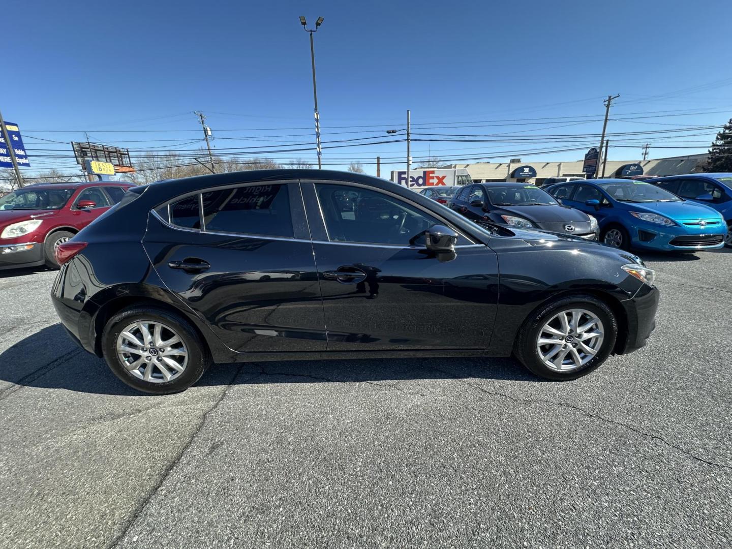 2015 BLACK Mazda MAZDA3 i Touring AT 5-Door (3MZBM1L72FM) with an 2.0L L4 DOHC 16V engine, 6-Speed Automatic transmission, located at 1254 Manheim Pike, Lancaster, PA, 17601, (717) 393-9133, 40.062870, -76.323273 - Photo#3
