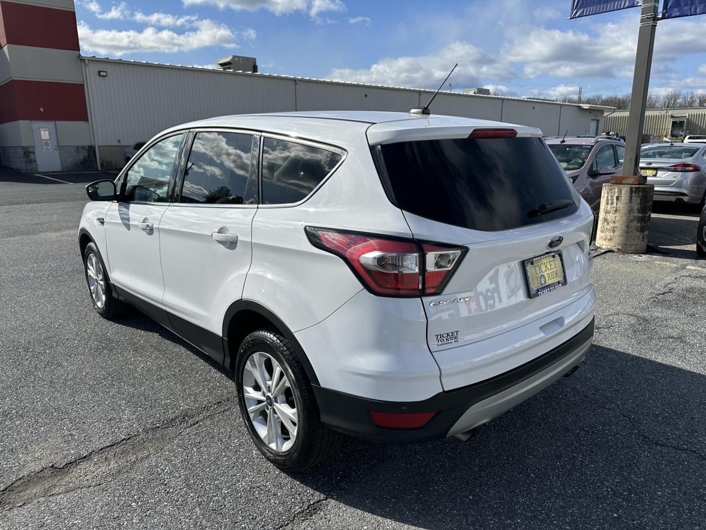 2017 WHITE Ford Escape SE FWD (1FMCU0GD0HU) with an 1.5L L4 DOHC 16V engine, 6A transmission, located at 1254 Manheim Pike, Lancaster, PA, 17601, (717) 393-9133, 40.062870, -76.323273 - Photo#4