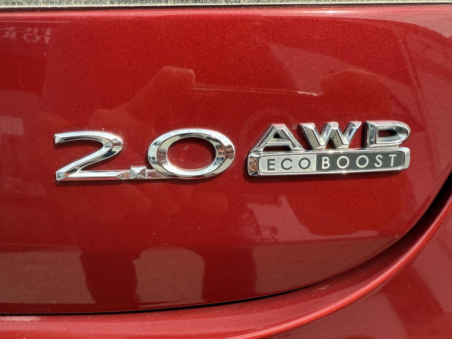 2015 RED Lincoln MKZ AWD (3LN6L2J9XFR) with an 2.0L L4 DOHC 16V engine, 6-Speed Automatic transmission, located at 1254 Manheim Pike, Lancaster, PA, 17601, (717) 393-9133, 40.062870, -76.323273 - Photo#4