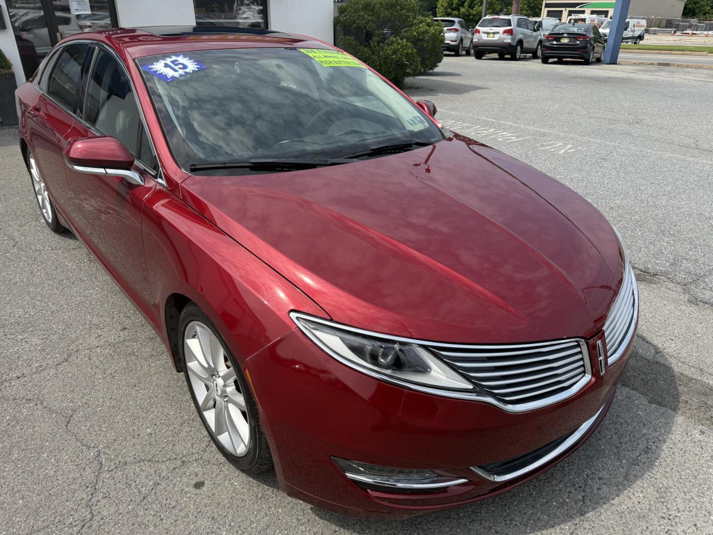 2015 RED Lincoln MKZ AWD (3LN6L2J9XFR) with an 2.0L L4 DOHC 16V engine, 6-Speed Automatic transmission, located at 1254 Manheim Pike, Lancaster, PA, 17601, (717) 393-9133, 40.062870, -76.323273 - Photo#2