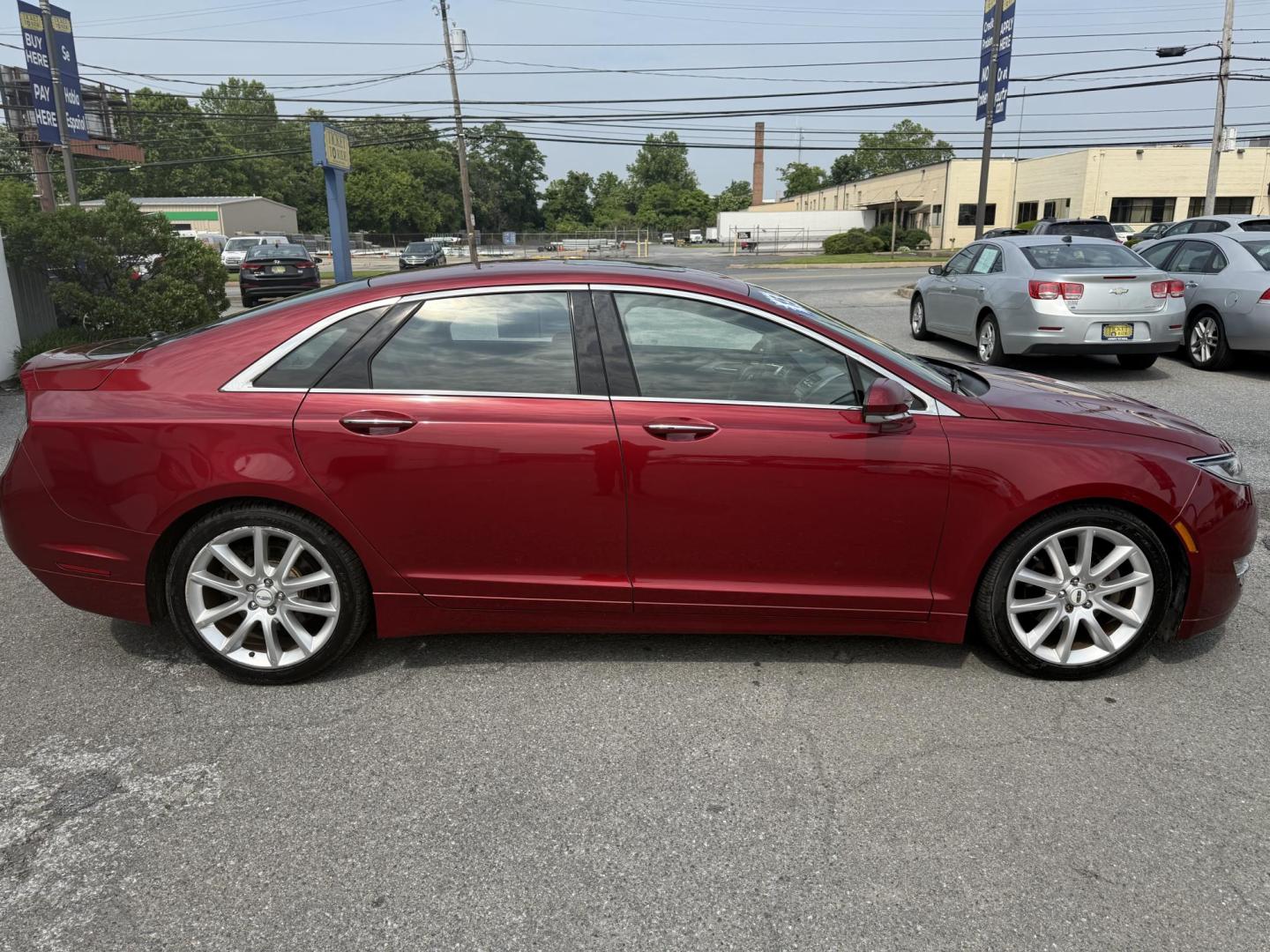 2015 RED Lincoln MKZ AWD (3LN6L2J9XFR) with an 2.0L L4 DOHC 16V engine, 6-Speed Automatic transmission, located at 1254 Manheim Pike, Lancaster, PA, 17601, (717) 393-9133, 40.062870, -76.323273 - Photo#3