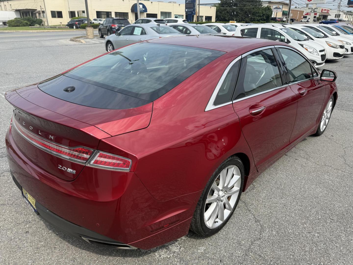 2015 RED Lincoln MKZ AWD (3LN6L2J9XFR) with an 2.0L L4 DOHC 16V engine, 6-Speed Automatic transmission, located at 1254 Manheim Pike, Lancaster, PA, 17601, (717) 393-9133, 40.062870, -76.323273 - Photo#6