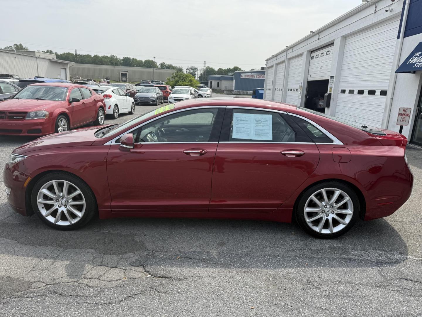2015 RED Lincoln MKZ AWD (3LN6L2J9XFR) with an 2.0L L4 DOHC 16V engine, 6-Speed Automatic transmission, located at 1254 Manheim Pike, Lancaster, PA, 17601, (717) 393-9133, 40.062870, -76.323273 - Photo#8