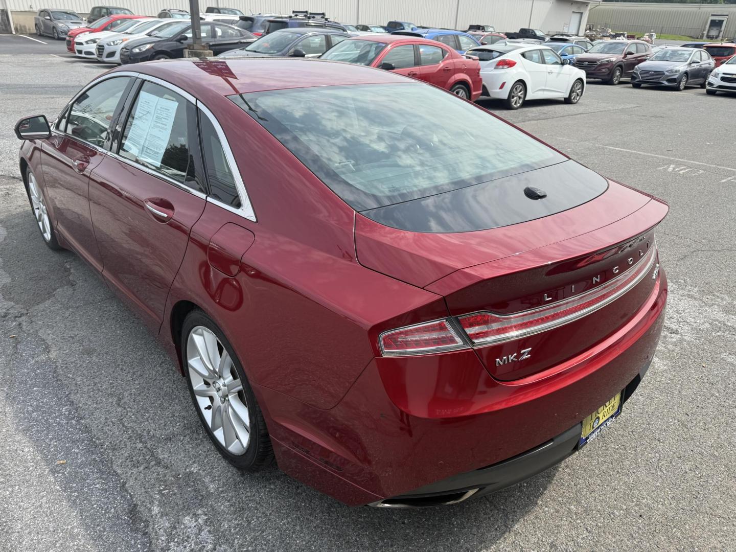 2015 RED Lincoln MKZ AWD (3LN6L2J9XFR) with an 2.0L L4 DOHC 16V engine, 6-Speed Automatic transmission, located at 1254 Manheim Pike, Lancaster, PA, 17601, (717) 393-9133, 40.062870, -76.323273 - Photo#9