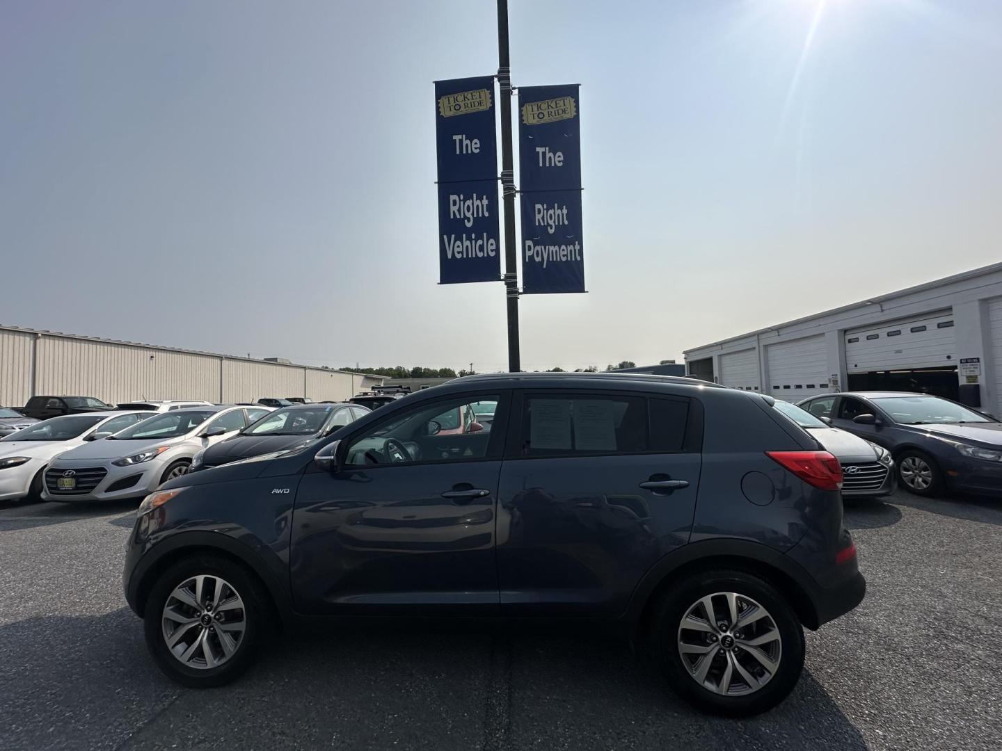 2015 BLUE Kia Sportage LX AWD (KNDPBCAC9F7) with an 2.4L V6 DOHC 24V engine, 6-Speed Automatic transmission, located at 1254 Manheim Pike, Lancaster, PA, 17601, (717) 393-9133, 40.062870, -76.323273 - Photo#7