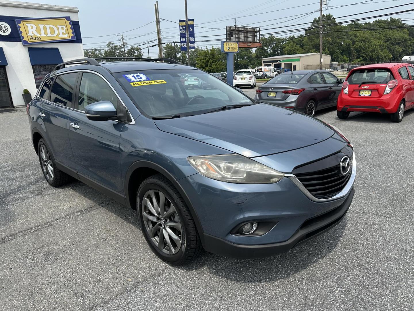 2015 BLUE Mazda CX-9 Grand Touring AWD (JM3TB3DV3F0) with an 3.7L V6 DOHC 24V engine, 6-Speed Automatic transmission, located at 1254 Manheim Pike, Lancaster, PA, 17601, (717) 393-9133, 40.062870, -76.323273 - Photo#2