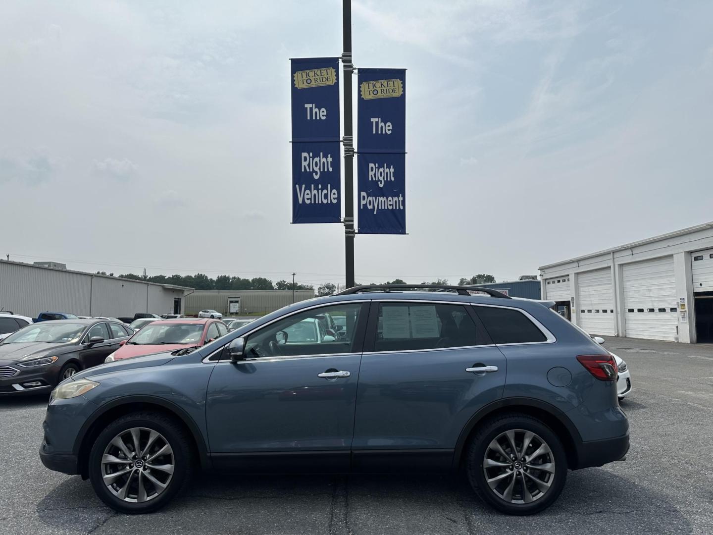 2015 BLUE Mazda CX-9 Grand Touring AWD (JM3TB3DV3F0) with an 3.7L V6 DOHC 24V engine, 6-Speed Automatic transmission, located at 1254 Manheim Pike, Lancaster, PA, 17601, (717) 393-9133, 40.062870, -76.323273 - Photo#5