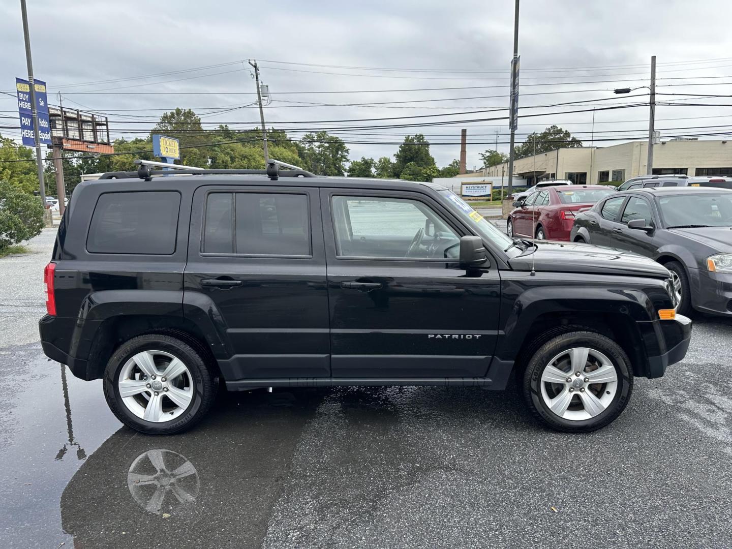 2014 BLACK Jeep Patriot Latitude 4WD (1C4NJRFB5ED) with an 2.4L L4 DOHC 16V engine, located at 1254 Manheim Pike, Lancaster, PA, 17601, (717) 393-9133, 40.062870, -76.323273 - Photo#5