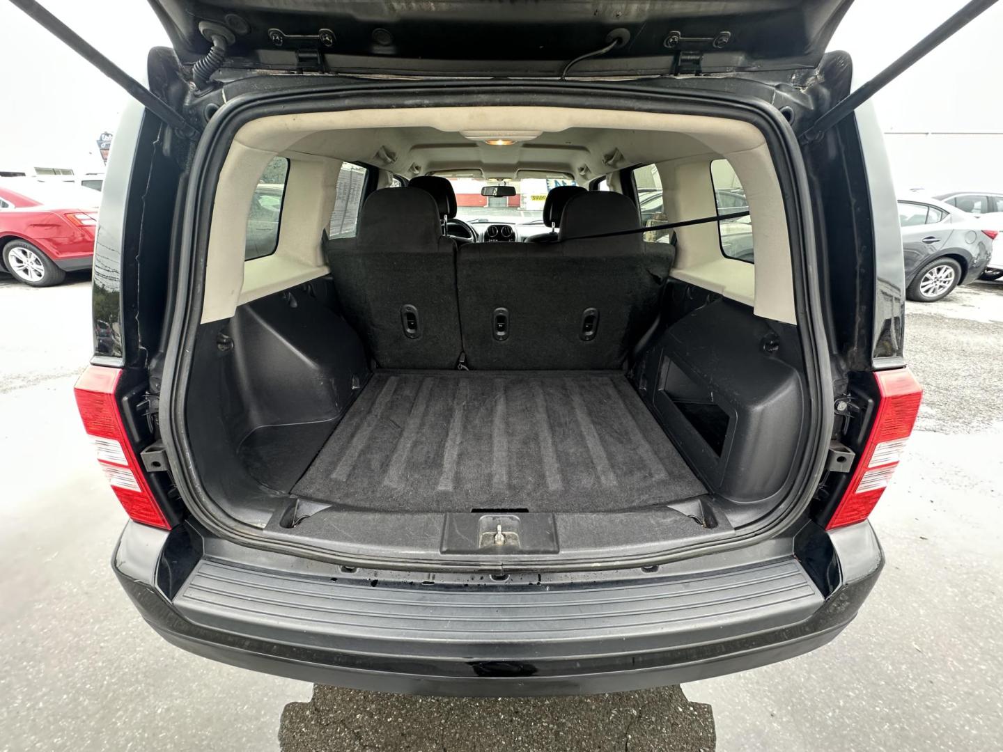 2014 BLACK Jeep Patriot Latitude 4WD (1C4NJRFB5ED) with an 2.4L L4 DOHC 16V engine, located at 1254 Manheim Pike, Lancaster, PA, 17601, (717) 393-9133, 40.062870, -76.323273 - Photo#10