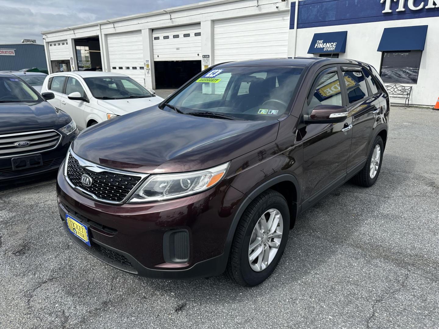 2014 BURGUNDY Kia Sorento LX 2WD (5XYKT3A60EG) with an 2.4L L4 DOHC 16V engine, 6-Speed Automatic transmission, located at 1254 Manheim Pike, Lancaster, PA, 17601, (717) 393-9133, 40.062870, -76.323273 - Photo#0