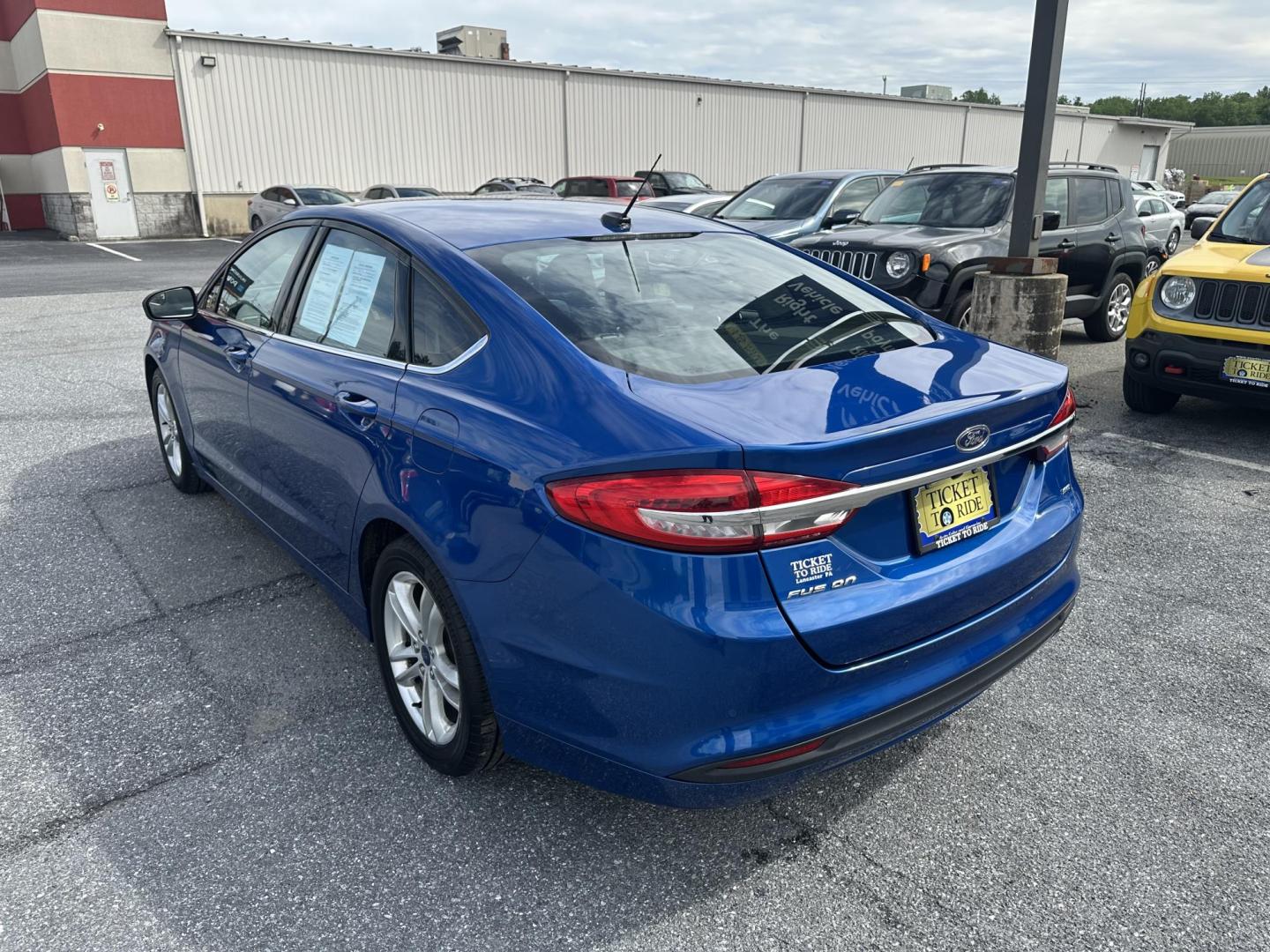 2018 BLUE Ford Fusion SE (3FA6P0H73JR) with an 2.5L L4 DOHC 16V engine, 6A transmission, located at 1254 Manheim Pike, Lancaster, PA, 17601, (717) 393-9133, 40.062870, -76.323273 - Stylish, comfortable, and built for everyday driving, this 2018 Ford Fusion SE delivers the perfect balance of performance, technology, and reliability. With its sleek exterior design and smooth handling, the Fusion stands out as a sedan that feels both refined and fun to drive. Inside, you’ll - Photo#4