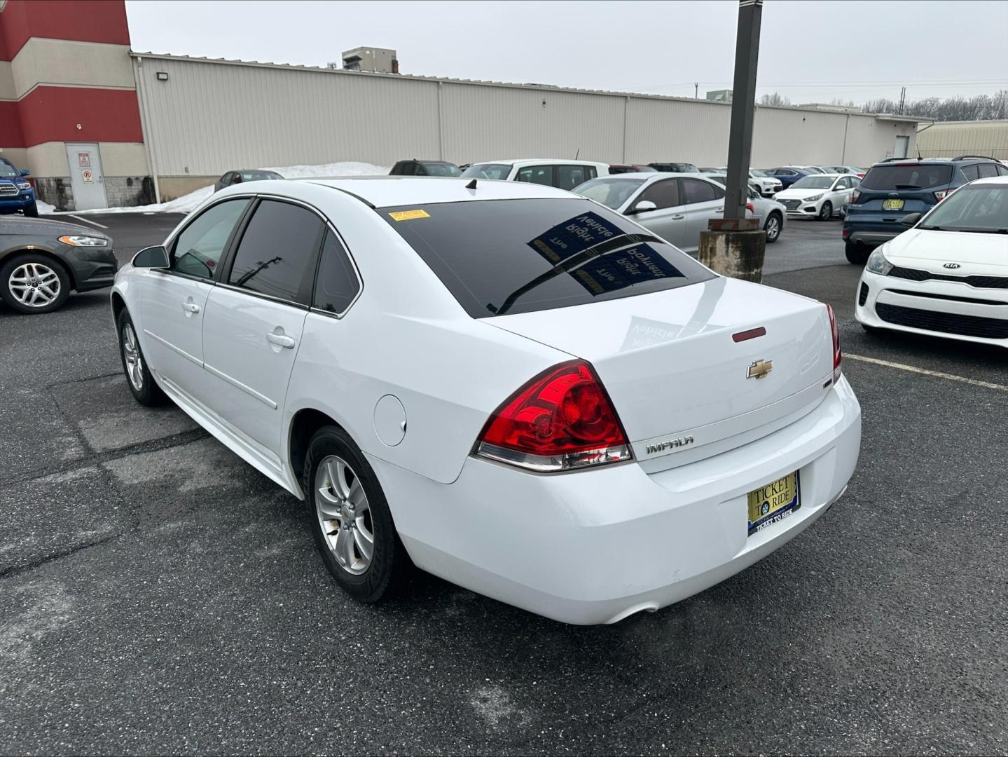 2015 WHITE Chevrolet Impala Limited LS (2G1WA5E33F1) with an 3.6L V6 DOHC 16V FFV engine, 6-Speed Automatic transmission, located at 1254 Manheim Pike, Lancaster, PA, 17601, (717) 393-9133, 40.062870, -76.323273 - Photo#6