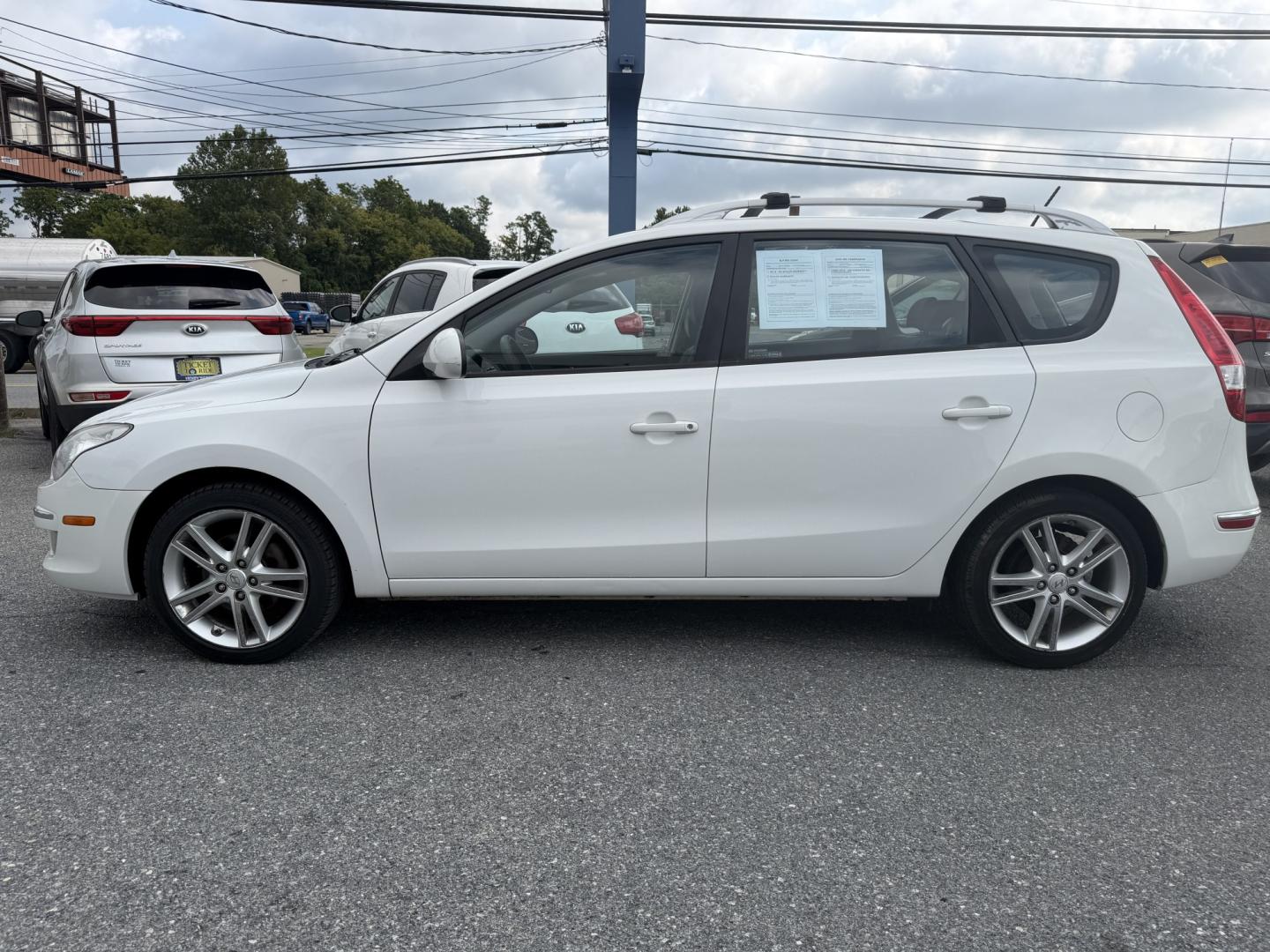 2012 WHITE Hyundai Elantra Touring SE Manual (KMHDC8AE9CU) with an 2.0L L4 DOHC 16V engine, 5-Speed Manual transmission, located at 1254 Manheim Pike, Lancaster, PA, 17601, (717) 393-9133, 40.062870, -76.323273- Photo#1