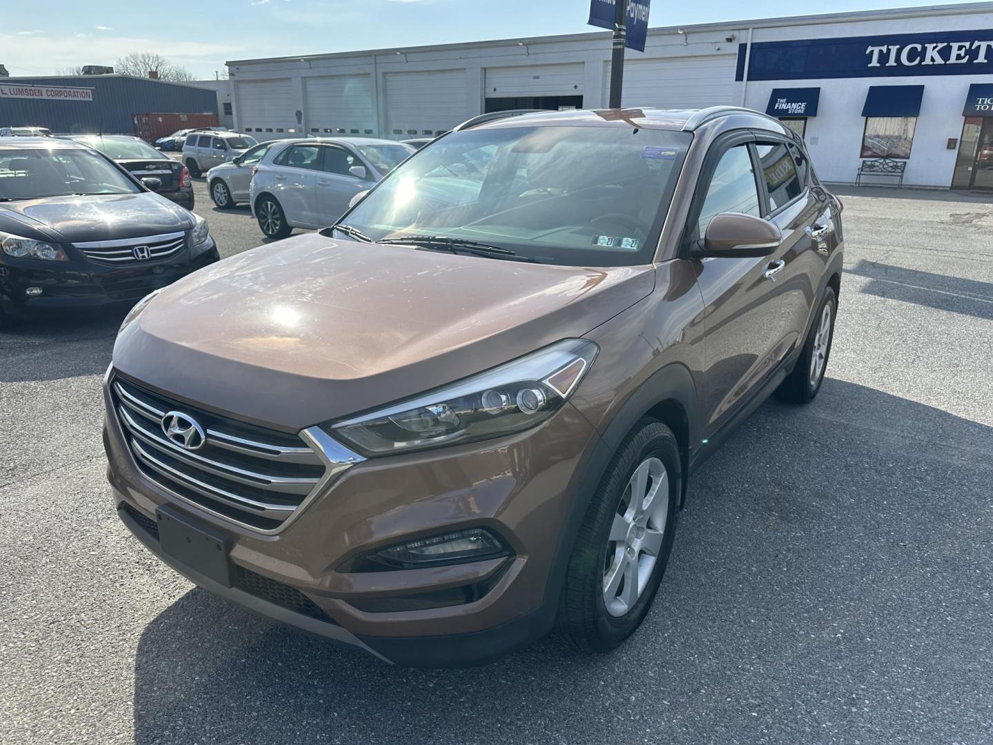 2016 ORANGE Hyundai Tucson Eco AWD (KM8J3CA2XGU) with an 1.6L L4 DOHC 16V engine, 7A transmission, located at 1254 Manheim Pike, Lancaster, PA, 17601, (717) 393-9133, 40.062870, -76.323273 - Photo#0