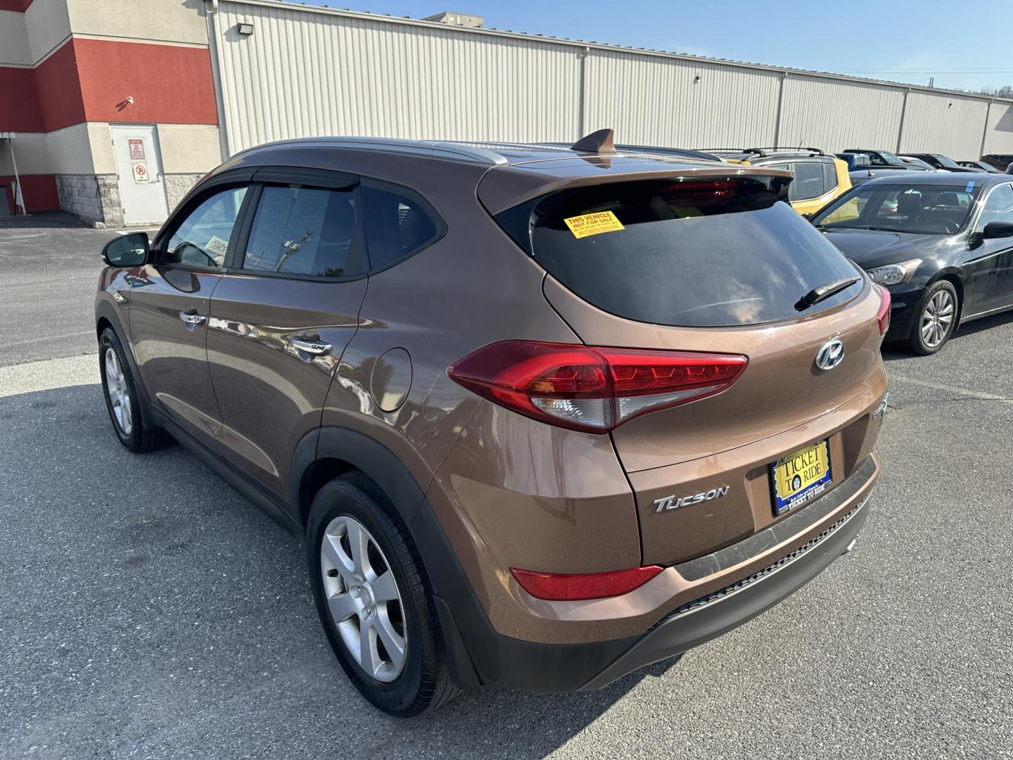 2016 ORANGE Hyundai Tucson Eco AWD (KM8J3CA2XGU) with an 1.6L L4 DOHC 16V engine, 7A transmission, located at 1254 Manheim Pike, Lancaster, PA, 17601, (717) 393-9133, 40.062870, -76.323273 - Photo#4
