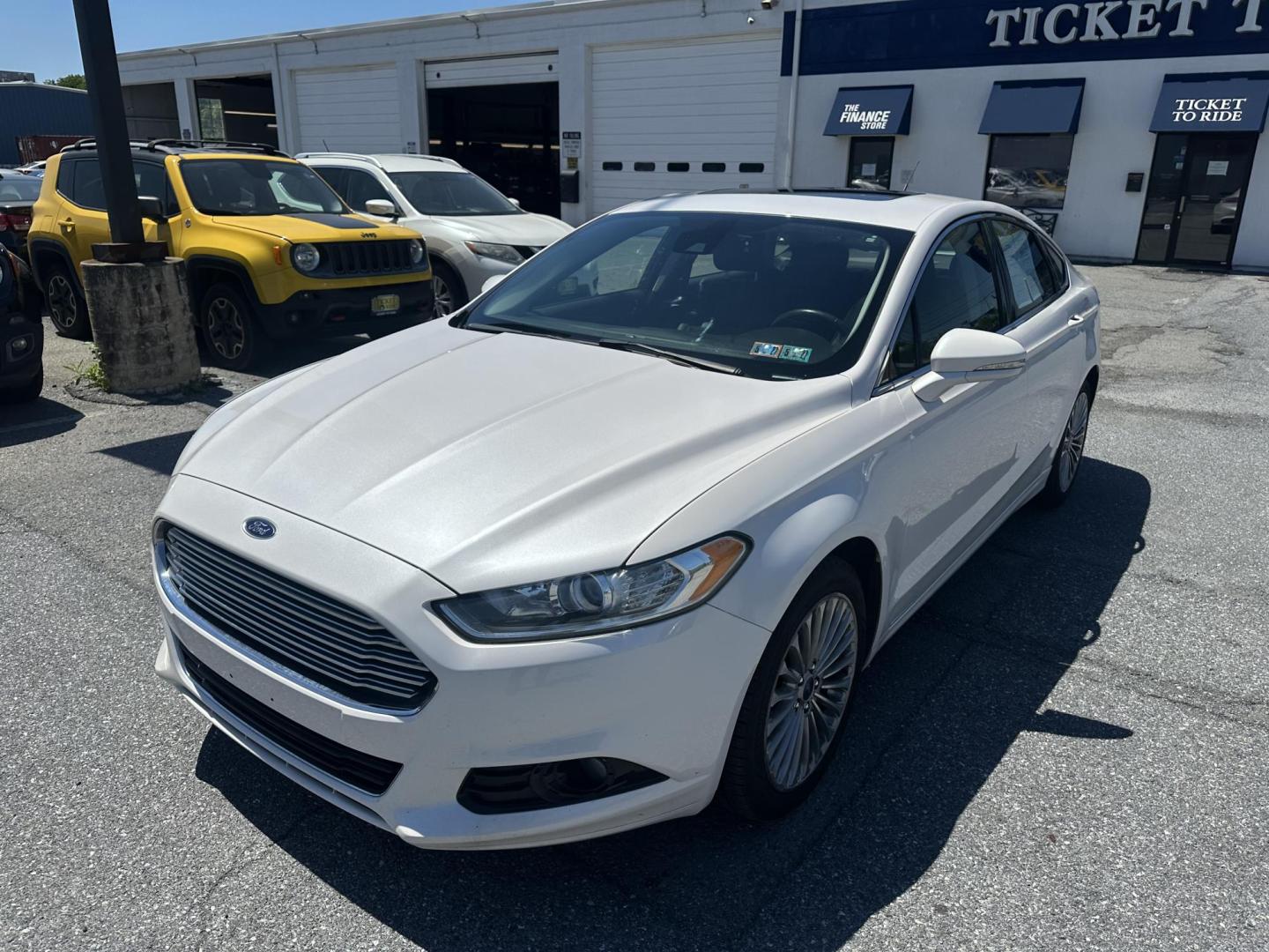 2016 WHITE Ford Fusion Titanium AWD (3FA6P0D92GR) with an 2.0L L4 DOHC 16V engine, 6A transmission, located at 1254 Manheim Pike, Lancaster, PA, 17601, (717) 393-9133, 40.062870, -76.323273 - Photo#0