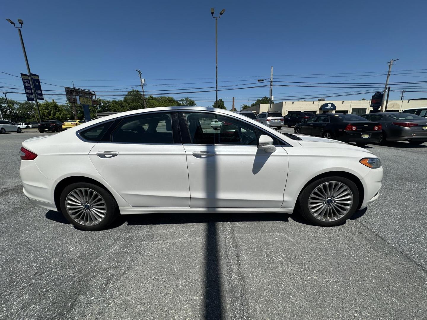 2016 WHITE Ford Fusion Titanium AWD (3FA6P0D92GR) with an 2.0L L4 DOHC 16V engine, 6A transmission, located at 1254 Manheim Pike, Lancaster, PA, 17601, (717) 393-9133, 40.062870, -76.323273 - Photo#3