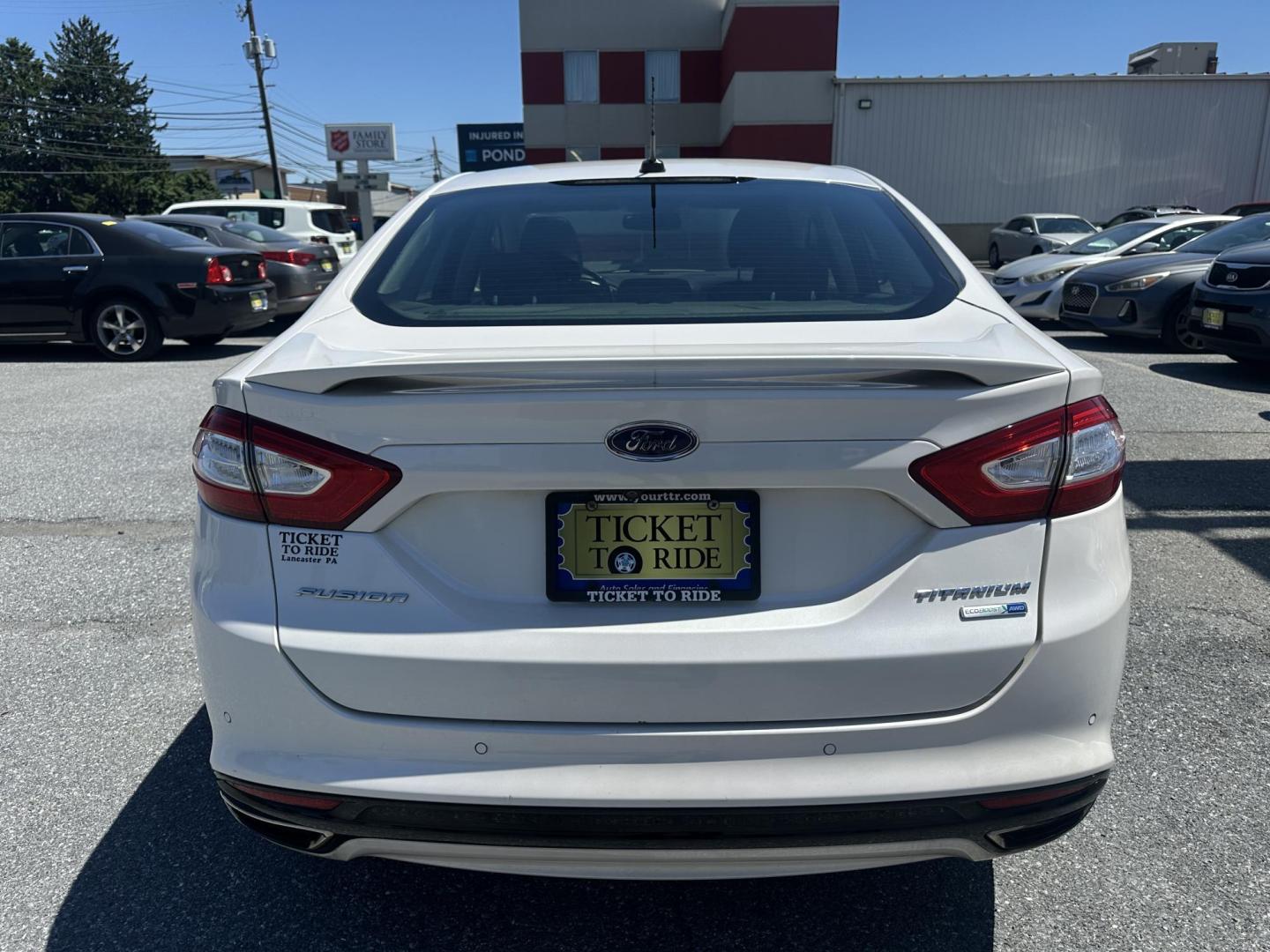 2016 WHITE Ford Fusion Titanium AWD (3FA6P0D92GR) with an 2.0L L4 DOHC 16V engine, 6A transmission, located at 1254 Manheim Pike, Lancaster, PA, 17601, (717) 393-9133, 40.062870, -76.323273 - Photo#5