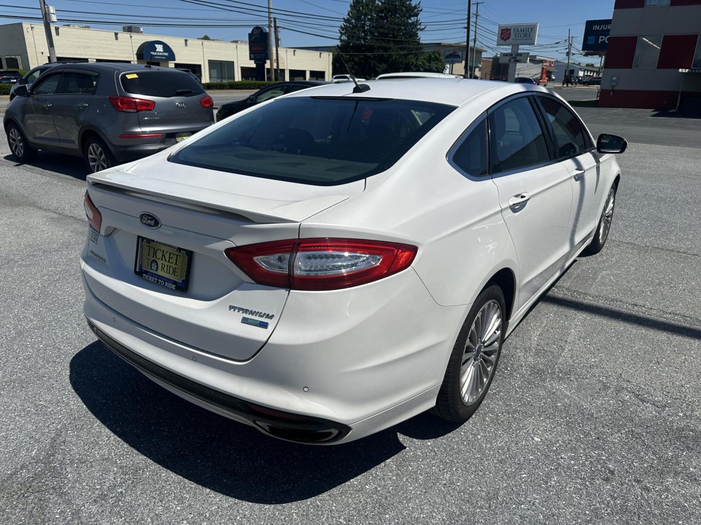 2016 WHITE Ford Fusion Titanium AWD (3FA6P0D92GR) with an 2.0L L4 DOHC 16V engine, 6A transmission, located at 1254 Manheim Pike, Lancaster, PA, 17601, (717) 393-9133, 40.062870, -76.323273 - Photo#6