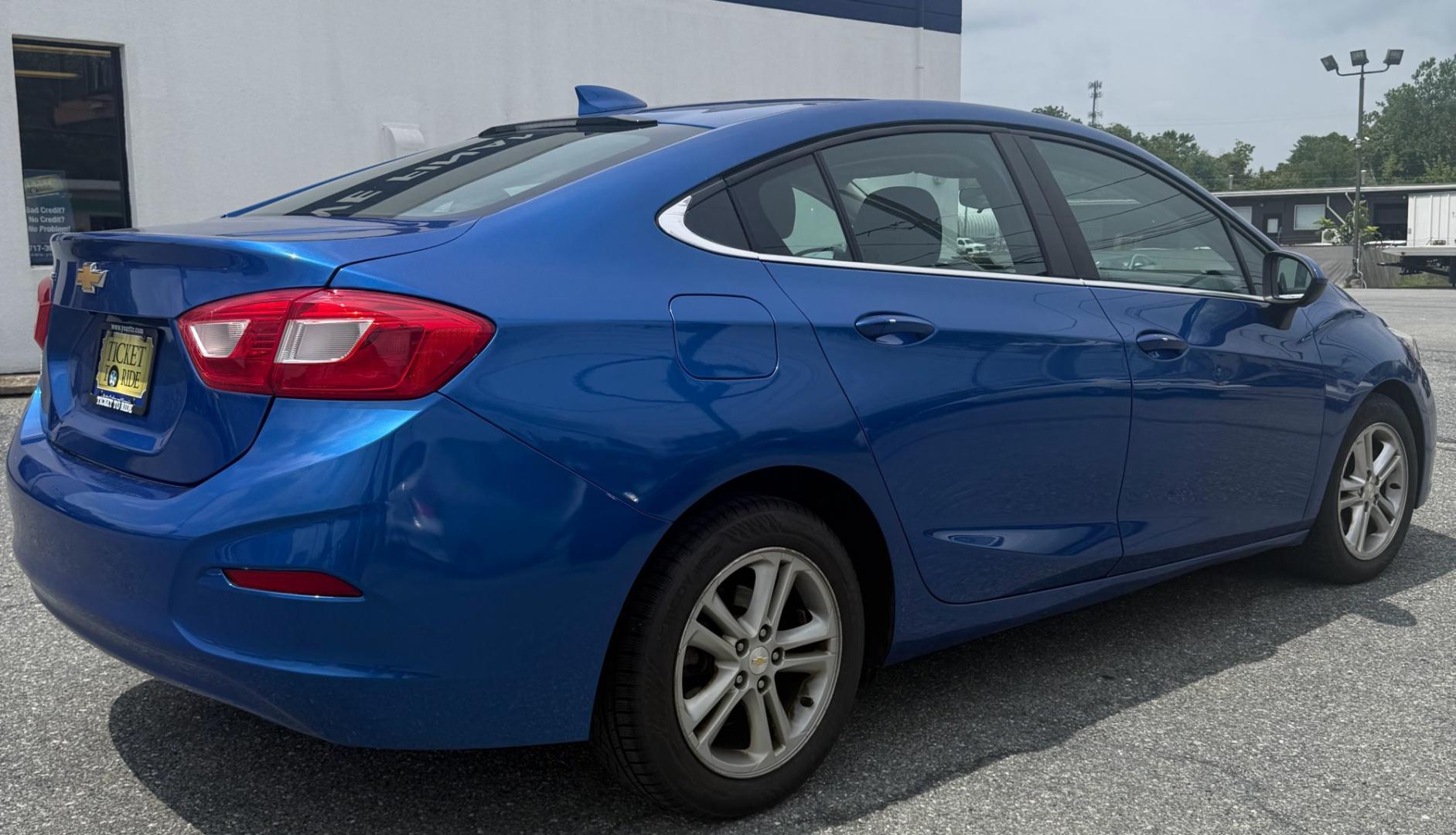 2016 BLUE Chevrolet Cruze LT Auto (1G1BE5SM1G7) with an 1.4L L4 DOHC 16V TURBO engine, 6A transmission, located at 1254 Manheim Pike, Lancaster, PA, 17601, (717) 393-9133, 40.062870, -76.323273 - The 2016 Chevrolet Cruze LT is a comfortable and efficient sedan that’s perfect for commuting, running errands, or everyday driving. It offers a smooth ride, a fuel-efficient turbocharged engine, and convenient features such as Bluetooth connectivity and a rearview camera. With its modern styling,- Photo#5