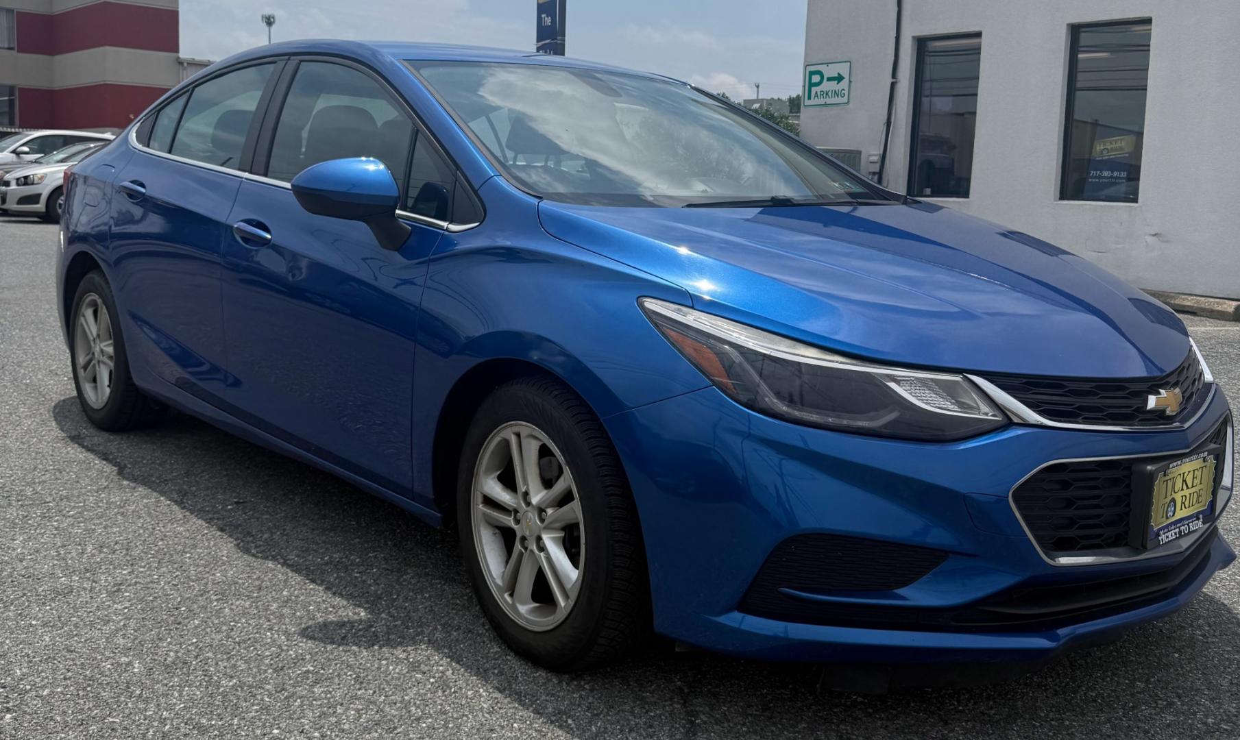 2016 BLUE Chevrolet Cruze LT Auto (1G1BE5SM1G7) with an 1.4L L4 DOHC 16V TURBO engine, 6A transmission, located at 1254 Manheim Pike, Lancaster, PA, 17601, (717) 393-9133, 40.062870, -76.323273 - The 2016 Chevrolet Cruze LT is a comfortable and efficient sedan that’s perfect for commuting, running errands, or everyday driving. It offers a smooth ride, a fuel-efficient turbocharged engine, and convenient features such as Bluetooth connectivity and a rearview camera. With its modern styling,- Photo#2