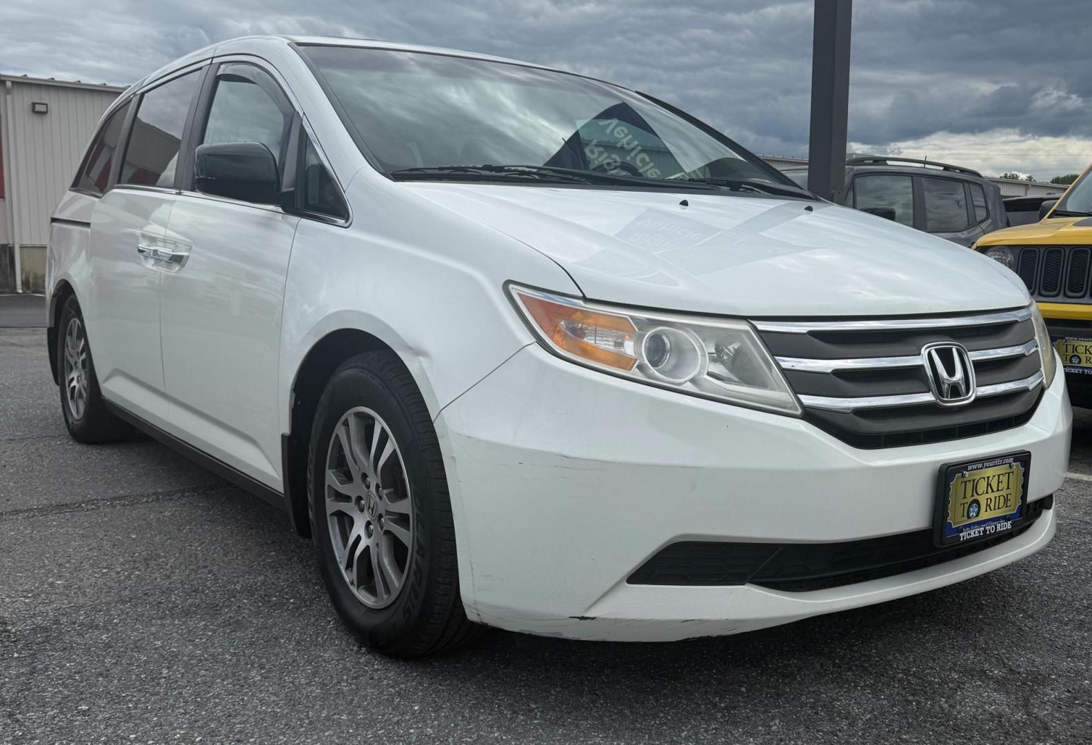 2012 WHITE Honda Odyssey EX-L (5FNRL5H64CB) with an 3.5L V6 SOHC 24V engine, 5-Speed Automatic transmission, located at 1254 Manheim Pike, Lancaster, PA, 17601, (717) 393-9133, 40.062870, -76.323273 - Roomy, comfortable, and built for family life, this 2012 Honda Odyssey EX-L is the perfect vehicle for busy schedules, road trips, and everyday driving. Known for its long-lasting reliability and smooth ride, the Odyssey continues to be one of the most trusted family vehicles on the road. The EX- - Photo#1