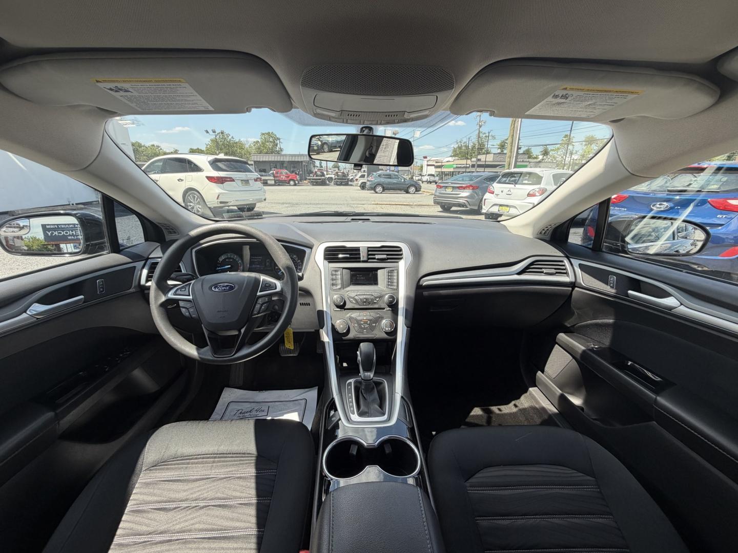 2016 BLACK Ford Fusion SE (3FA6P0HDXGR) with an 1.5L L4 DOHC 16V engine, 6A transmission, located at 1254 Manheim Pike, Lancaster, PA, 17601, (717) 393-9133, 40.062870, -76.323273 - Stylish, comfortable, and ready to go! The 2016 Ford Fusion SE offers a smooth ride, a roomy interior, and sharp styling that still looks great today. Whether you’re commuting to work or heading out for the weekend, this midsize sedan delivers comfort, practicality, and value. Bad credit or no- Photo#7