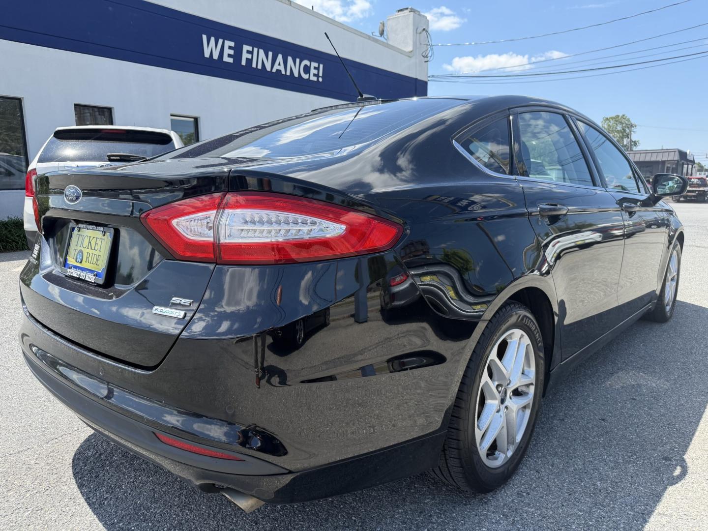 2016 BLACK Ford Fusion SE (3FA6P0HDXGR) with an 1.5L L4 DOHC 16V engine, 6A transmission, located at 1254 Manheim Pike, Lancaster, PA, 17601, (717) 393-9133, 40.062870, -76.323273 - Stylish, comfortable, and ready to go! The 2016 Ford Fusion SE offers a smooth ride, a roomy interior, and sharp styling that still looks great today. Whether you’re commuting to work or heading out for the weekend, this midsize sedan delivers comfort, practicality, and value. Bad credit or no- Photo#3