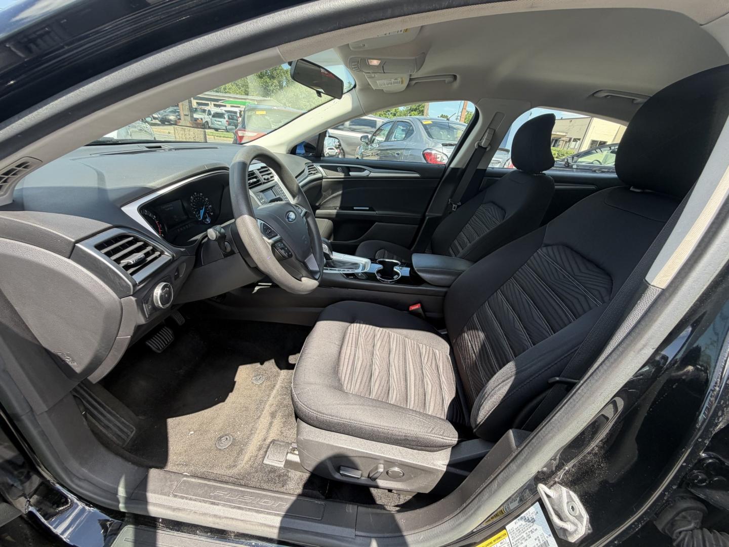 2016 BLACK Ford Fusion SE (3FA6P0HDXGR) with an 1.5L L4 DOHC 16V engine, 6A transmission, located at 1254 Manheim Pike, Lancaster, PA, 17601, (717) 393-9133, 40.062870, -76.323273 - Stylish, comfortable, and ready to go! The 2016 Ford Fusion SE offers a smooth ride, a roomy interior, and sharp styling that still looks great today. Whether you’re commuting to work or heading out for the weekend, this midsize sedan delivers comfort, practicality, and value. Bad credit or no- Photo#11