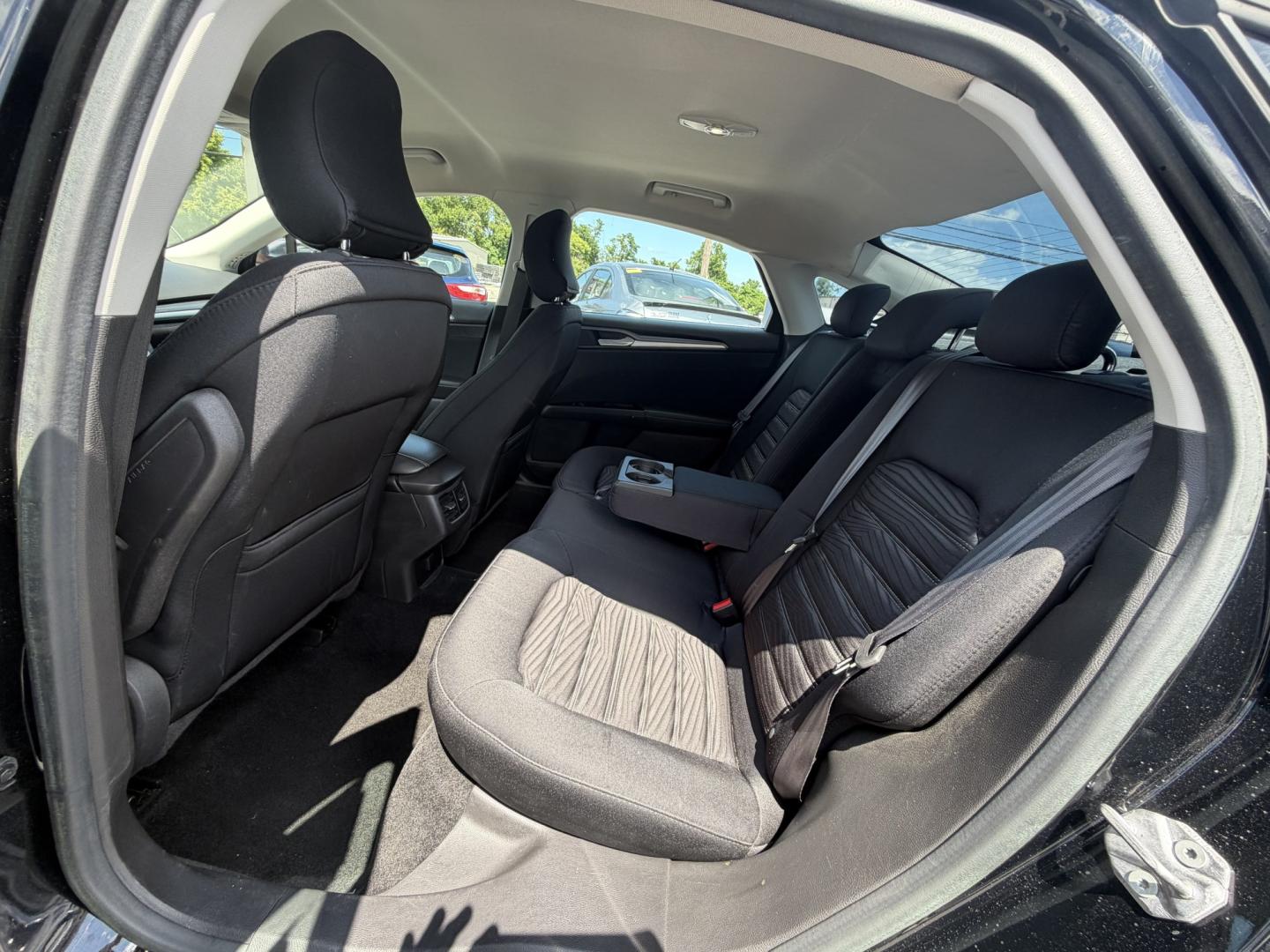 2016 BLACK Ford Fusion SE (3FA6P0HDXGR) with an 1.5L L4 DOHC 16V engine, 6A transmission, located at 1254 Manheim Pike, Lancaster, PA, 17601, (717) 393-9133, 40.062870, -76.323273 - Stylish, comfortable, and ready to go! The 2016 Ford Fusion SE offers a smooth ride, a roomy interior, and sharp styling that still looks great today. Whether you’re commuting to work or heading out for the weekend, this midsize sedan delivers comfort, practicality, and value. Bad credit or no- Photo#12