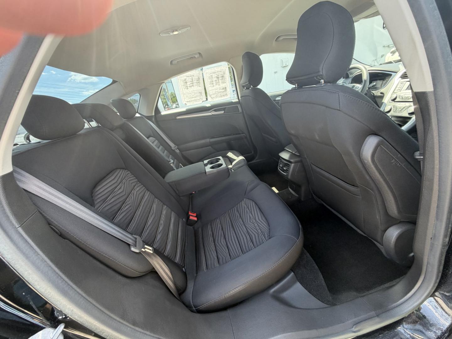 2016 BLACK Ford Fusion SE (3FA6P0HDXGR) with an 1.5L L4 DOHC 16V engine, 6A transmission, located at 1254 Manheim Pike, Lancaster, PA, 17601, (717) 393-9133, 40.062870, -76.323273 - Stylish, comfortable, and ready to go! The 2016 Ford Fusion SE offers a smooth ride, a roomy interior, and sharp styling that still looks great today. Whether you’re commuting to work or heading out for the weekend, this midsize sedan delivers comfort, practicality, and value. Bad credit or no- Photo#13