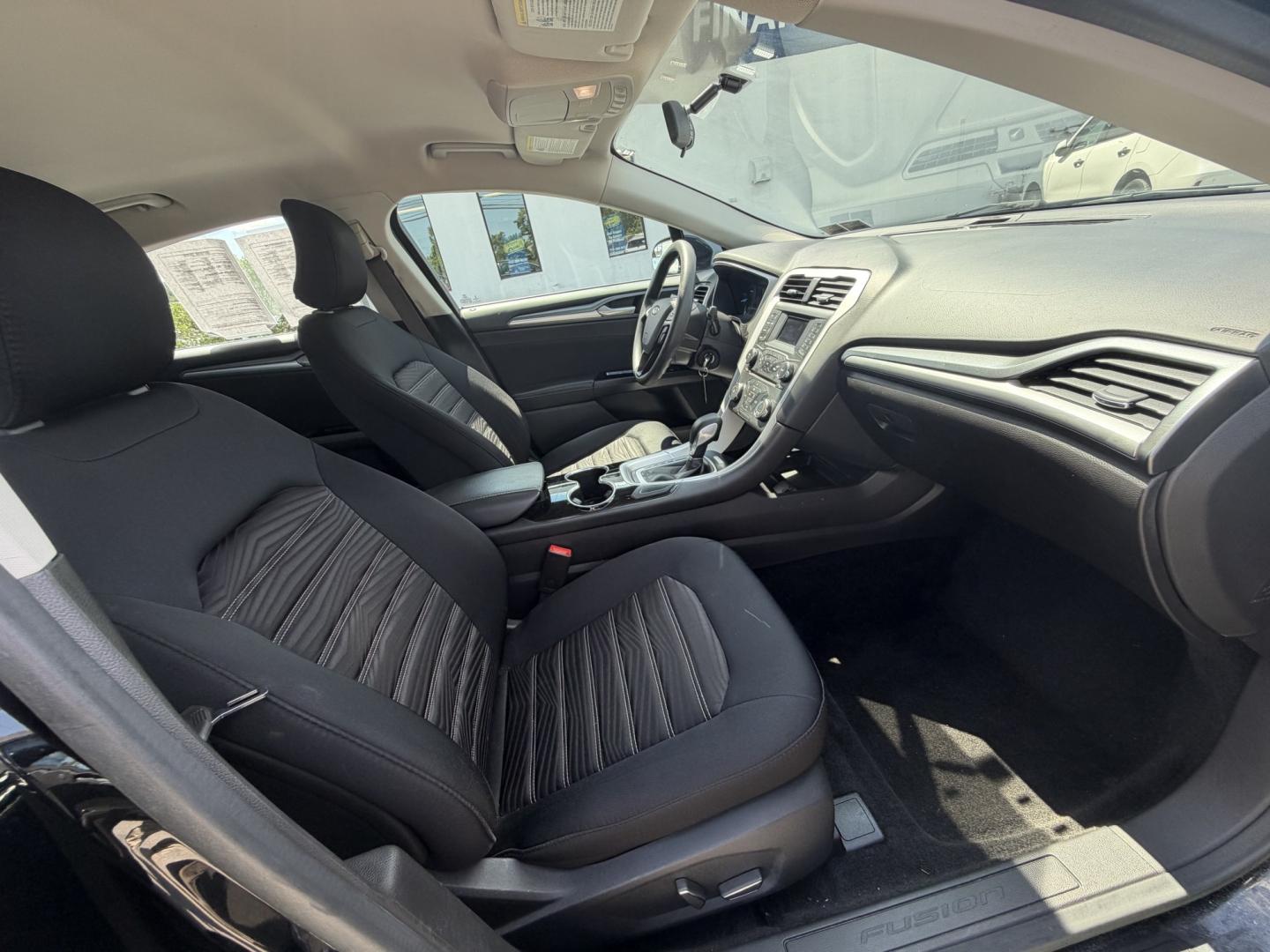 2016 BLACK Ford Fusion SE (3FA6P0HDXGR) with an 1.5L L4 DOHC 16V engine, 6A transmission, located at 1254 Manheim Pike, Lancaster, PA, 17601, (717) 393-9133, 40.062870, -76.323273 - Stylish, comfortable, and ready to go! The 2016 Ford Fusion SE offers a smooth ride, a roomy interior, and sharp styling that still looks great today. Whether you’re commuting to work or heading out for the weekend, this midsize sedan delivers comfort, practicality, and value. Bad credit or no- Photo#14