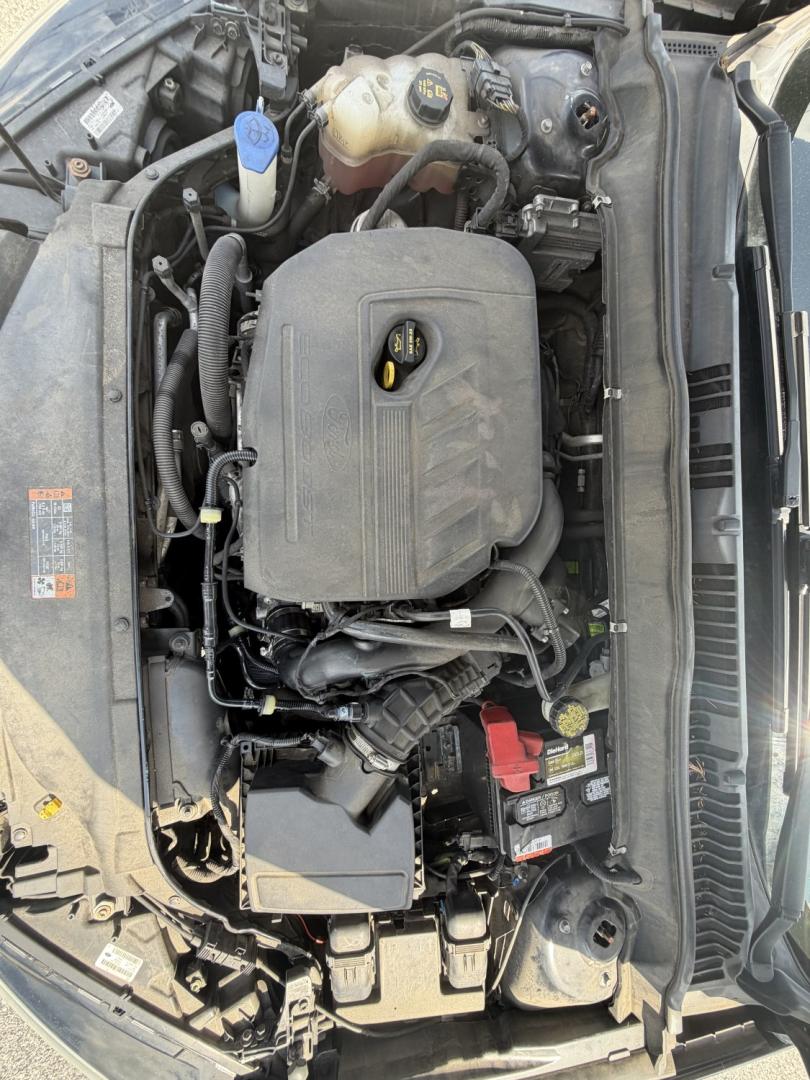 2016 BLACK Ford Fusion SE (3FA6P0HDXGR) with an 1.5L L4 DOHC 16V engine, 6A transmission, located at 1254 Manheim Pike, Lancaster, PA, 17601, (717) 393-9133, 40.062870, -76.323273 - Stylish, comfortable, and ready to go! The 2016 Ford Fusion SE offers a smooth ride, a roomy interior, and sharp styling that still looks great today. Whether you’re commuting to work or heading out for the weekend, this midsize sedan delivers comfort, practicality, and value. Bad credit or no- Photo#16
