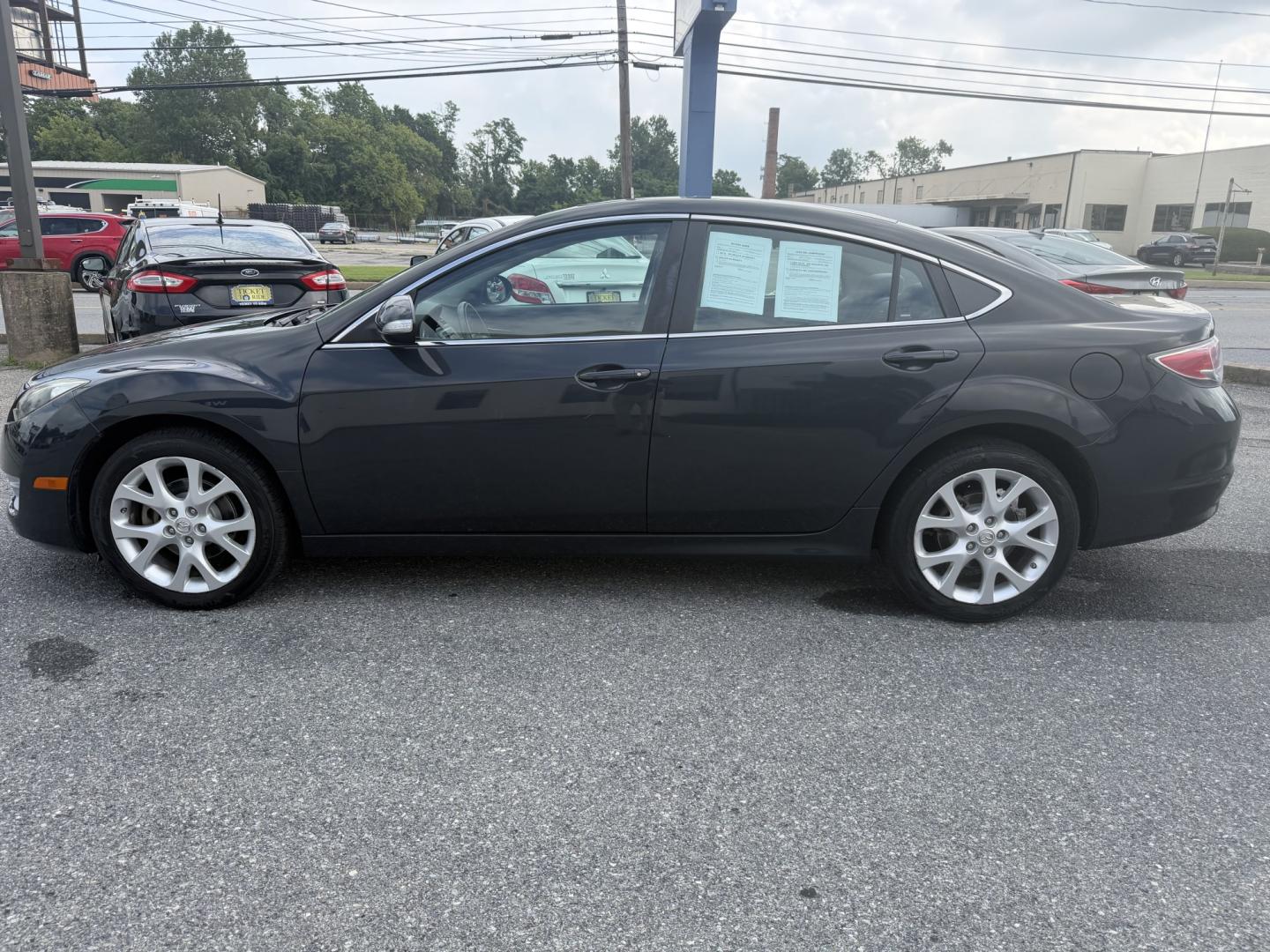 2013 BLACK Mazda MAZDA6 i Touring Plus (1YVHZ8EH7D5) with an 2.5L L4 DOHC 16V engine, 6-Speed Automatic transmission, located at 1254 Manheim Pike, Lancaster, PA, 17601, (717) 393-9133, 40.062870, -76.323273- Photo#1