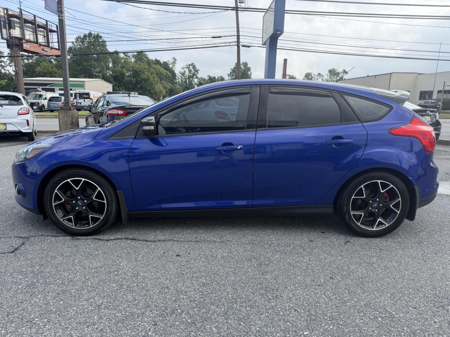 2013 BLUE Ford Focus SE Hatch (1FADP3K21DL) with an 2.0L L4 DOHC 16V engine, located at 1254 Manheim Pike, Lancaster, PA, 17601, (717) 393-9133, 40.062870, -76.323273- Photo#1