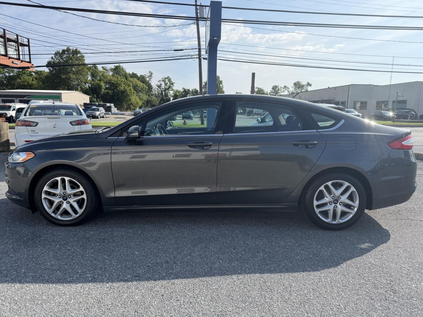 2016 GREY Ford Fusion SE (3FA6P0H70GR) with an 2.5L L4 DOHC 16V engine, 6A transmission, located at 1254 Manheim Pike, Lancaster, PA, 17601, (717) 393-9133, 40.062870, -76.323273- Photo#1