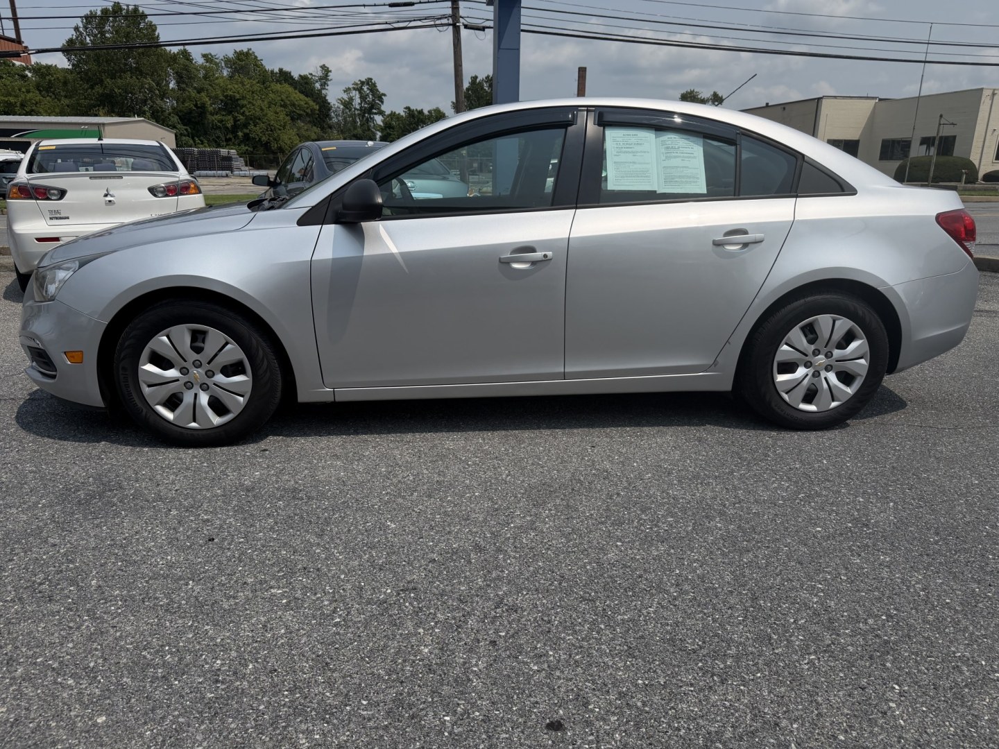 2016 SILVER Chevrolet Cruze Limited LS Auto (1G1PC5SG5G7) with an 1.8L L4 DOHC 16V FFV engine, 6A transmission, located at 1254 Manheim Pike, Lancaster, PA, 17601, (717) 393-9133, 40.062870, -76.323273- Photo#1