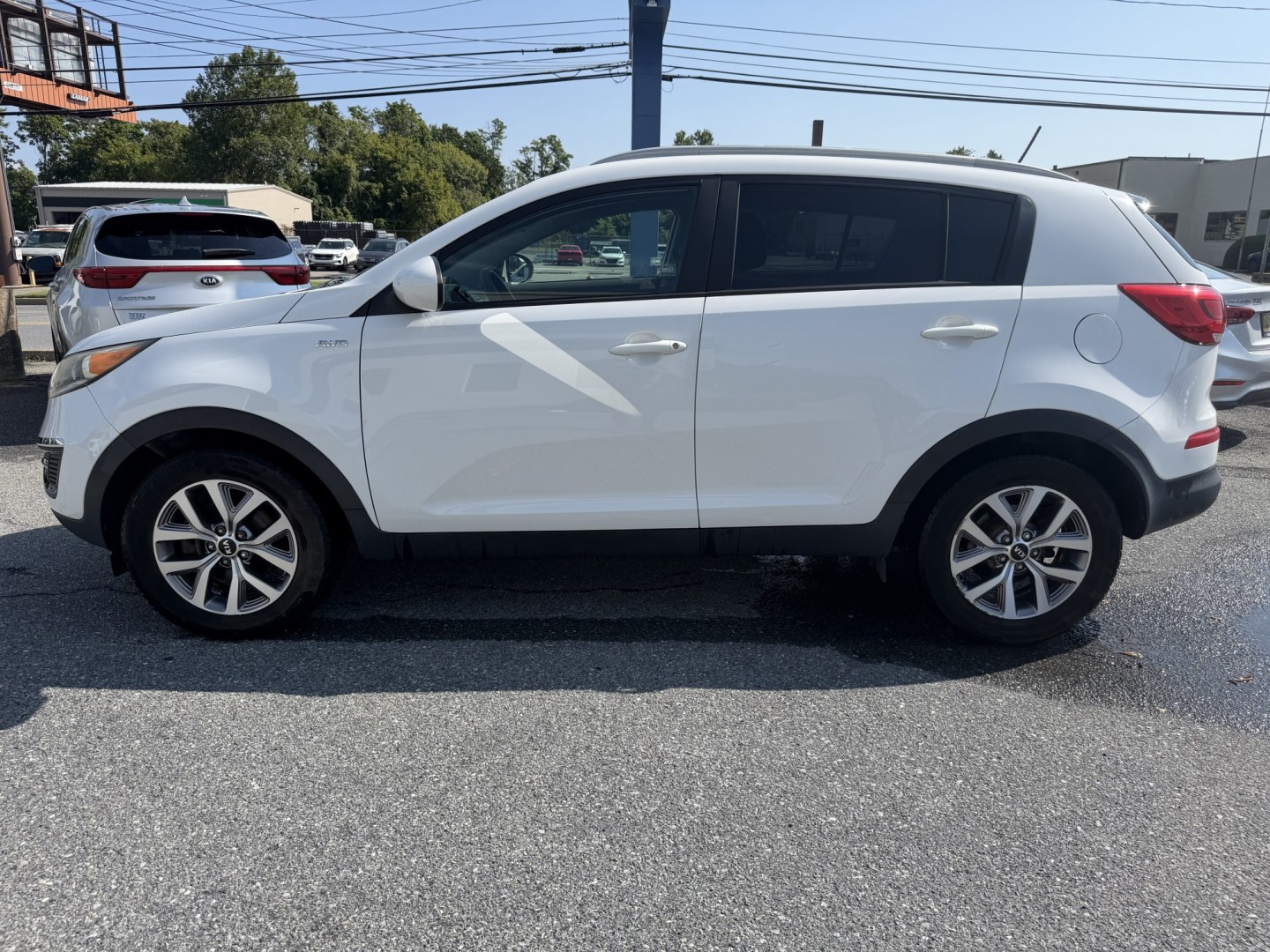 2016 WHITE Kia Sportage LX AWD (KNDPBCAC1G7) with an 2.4L V6 DOHC 24V engine, 6-Speed Automatic transmission, located at 1254 Manheim Pike, Lancaster, PA, 17601, (717) 393-9133, 40.062870, -76.323273- Photo#1