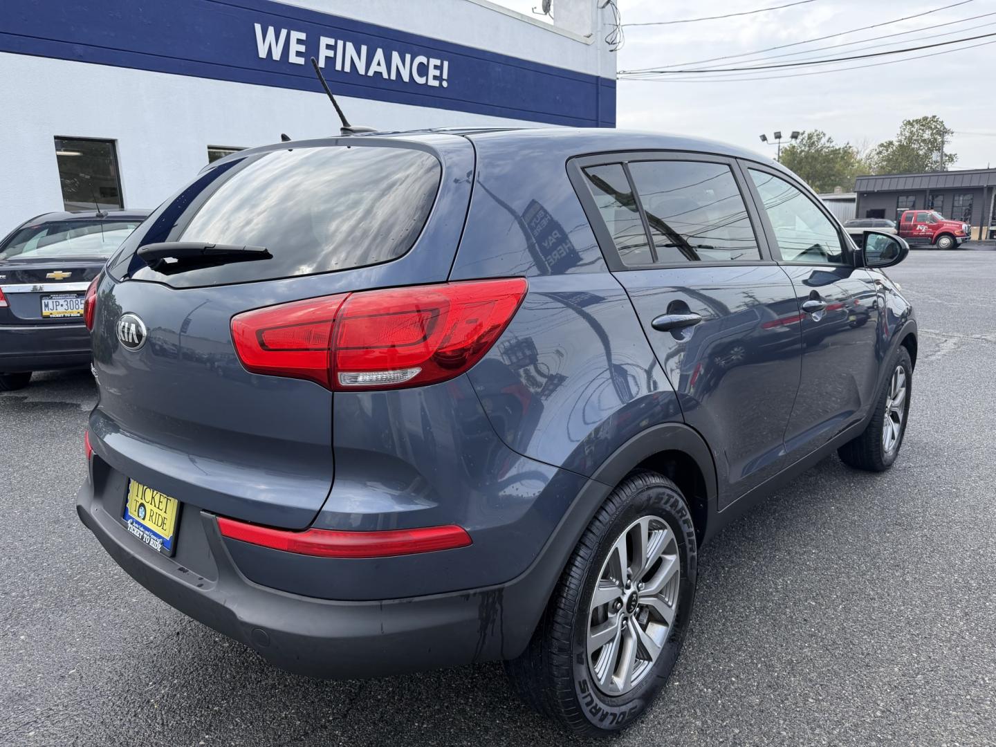 2016 BLUE Kia Sportage LX AWD (KNDPBCAC5G7) with an 2.4L V6 DOHC 24V engine, 6-Speed Automatic transmission, located at 1254 Manheim Pike, Lancaster, PA, 17601, (717) 393-9133, 40.062870, -76.323273- Photo#2