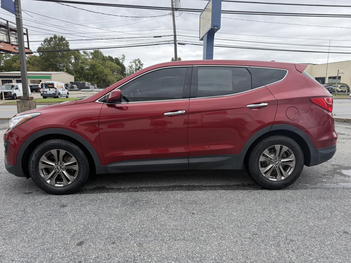 2013 RED Hyundai Santa Fe Sport 2.4 FWD (5XYZT3LB3DG) with an 2.4L L4 DOHC 16V engine, 6-Speed Automatic transmission, located at 1254 Manheim Pike, Lancaster, PA, 17601, (717) 393-9133, 40.062870, -76.323273 - Make the most of your daily drive with this 2013 Hyundai Santa Fe Sport 2.4 FWD! With a sporty look, a spacious interior, and versatile cargo space, this SUV is a practical fit for busy weekdays and weekend adventures. Visit Ticket To Ride Auto Sales in Lancaster to take a closer look and explore fi- Photo#1