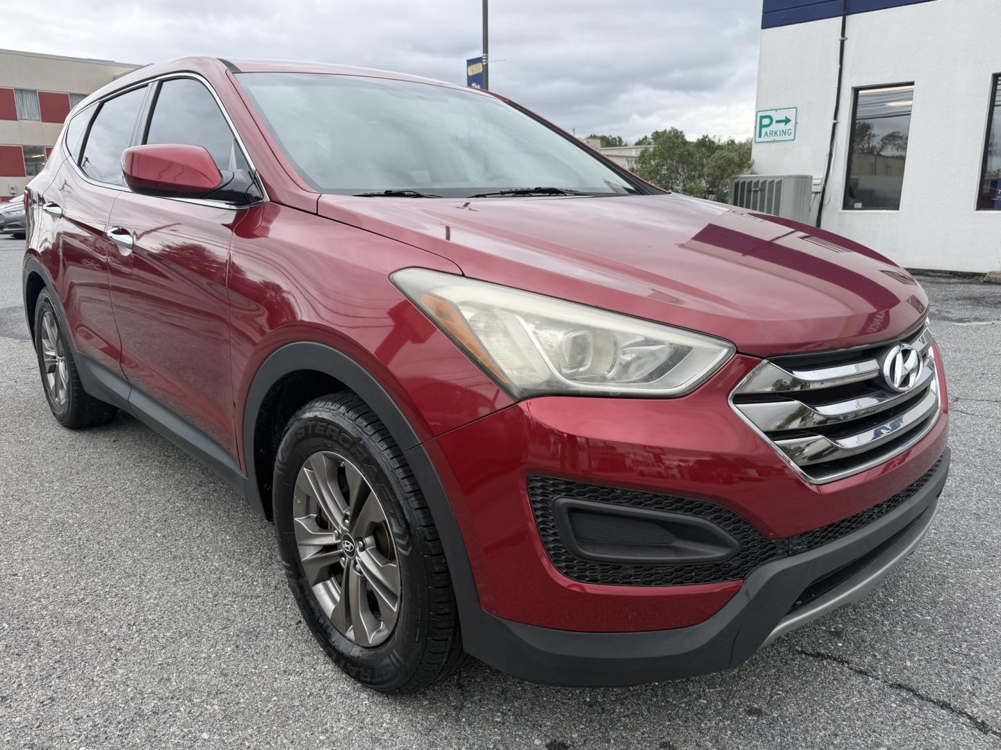 2013 RED Hyundai Santa Fe Sport 2.4 FWD (5XYZT3LB3DG) with an 2.4L L4 DOHC 16V engine, 6-Speed Automatic transmission, located at 1254 Manheim Pike, Lancaster, PA, 17601, (717) 393-9133, 40.062870, -76.323273 - Make the most of your daily drive with this 2013 Hyundai Santa Fe Sport 2.4 FWD! With a sporty look, a spacious interior, and versatile cargo space, this SUV is a practical fit for busy weekdays and weekend adventures. Visit Ticket To Ride Auto Sales in Lancaster to take a closer look and explore fi- Photo#5
