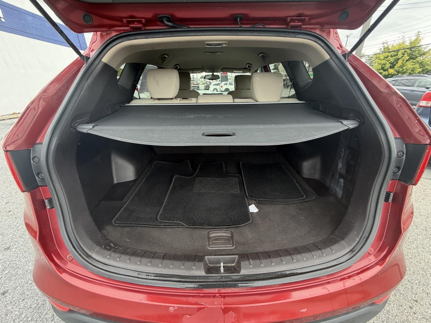 2013 RED Hyundai Santa Fe Sport 2.4 FWD (5XYZT3LB3DG) with an 2.4L L4 DOHC 16V engine, 6-Speed Automatic transmission, located at 1254 Manheim Pike, Lancaster, PA, 17601, (717) 393-9133, 40.062870, -76.323273 - Make the most of your daily drive with this 2013 Hyundai Santa Fe Sport 2.4 FWD! With a sporty look, a spacious interior, and versatile cargo space, this SUV is a practical fit for busy weekdays and weekend adventures. Visit Ticket To Ride Auto Sales in Lancaster to take a closer look and explore fi- Photo#16