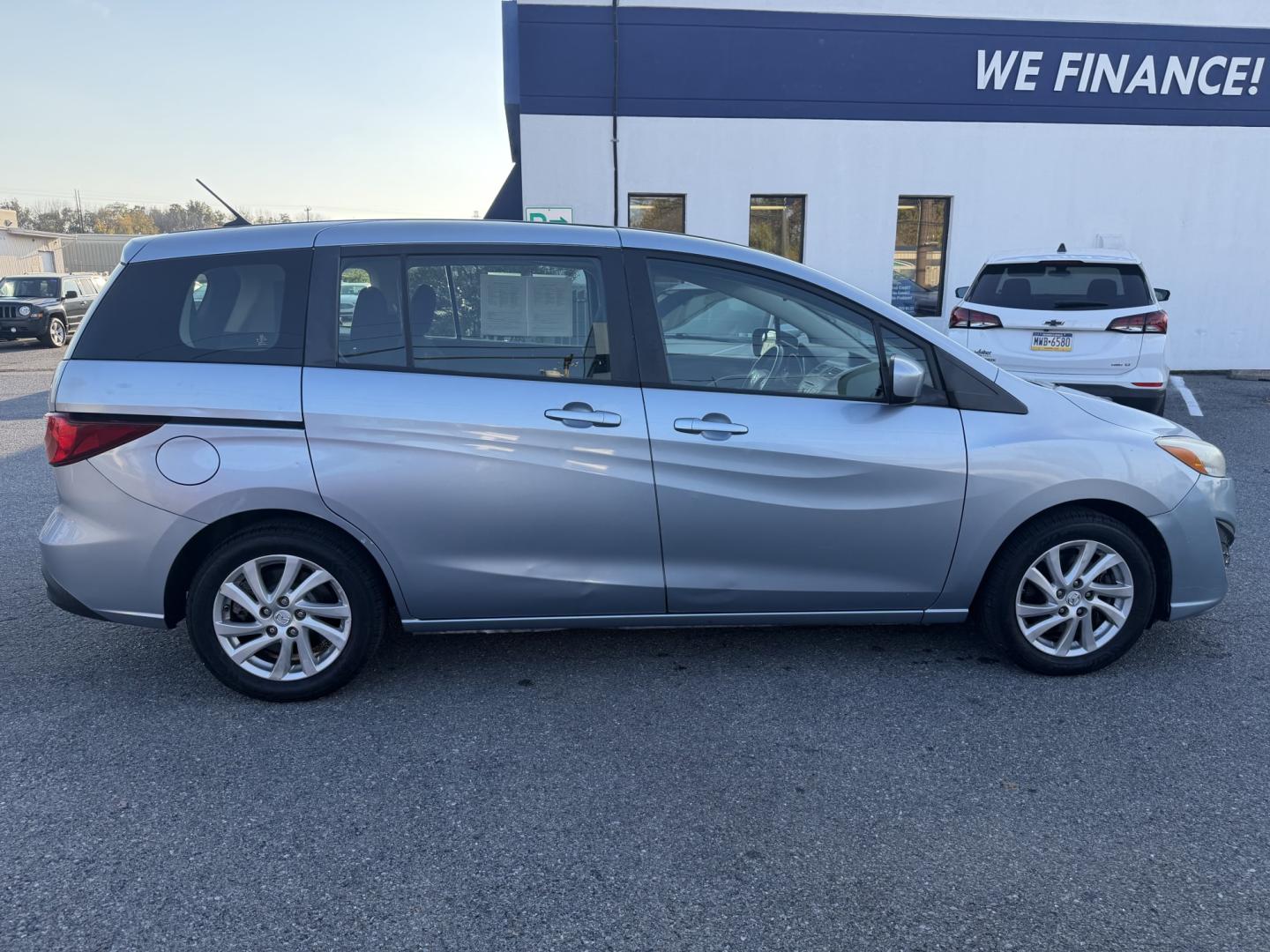 2011 BLUE Mazda MAZDA5 Sport (JM1CW2BL9C0) with an 2.5L L4 DOHC 16V engine, located at 1254 Manheim Pike, Lancaster, PA, 17601, (717) 393-9133, 40.062870, -76.323273- Photo#3