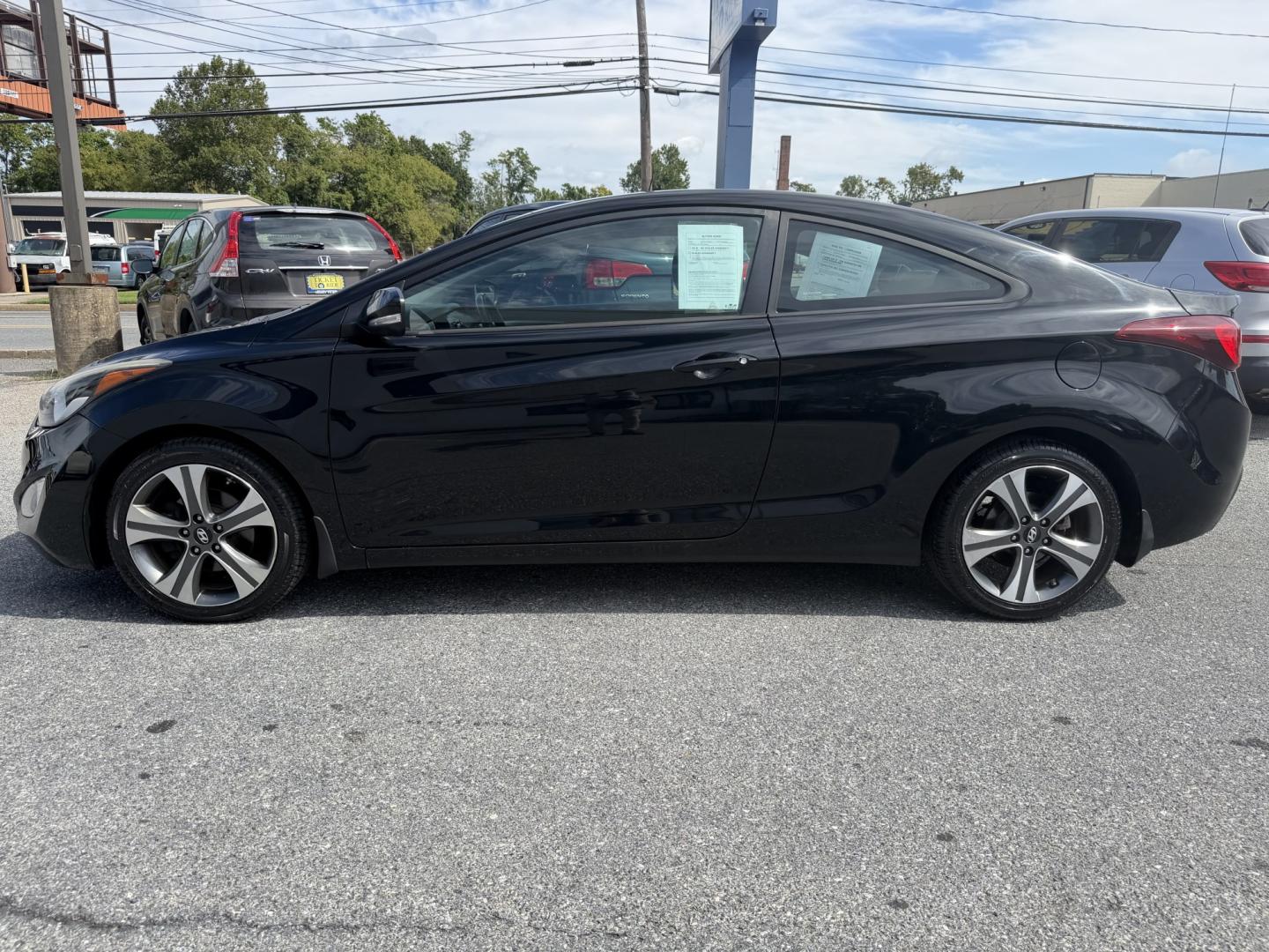 2014 BLACK Hyundai Elantra Coupe A/T (KMHDH6AH9EU) with an 2.0L L4 DOHC 16V engine, 6-Speed Automatic transmission, located at 1254 Manheim Pike, Lancaster, PA, 17601, (717) 393-9133, 40.062870, -76.323273- Photo#1