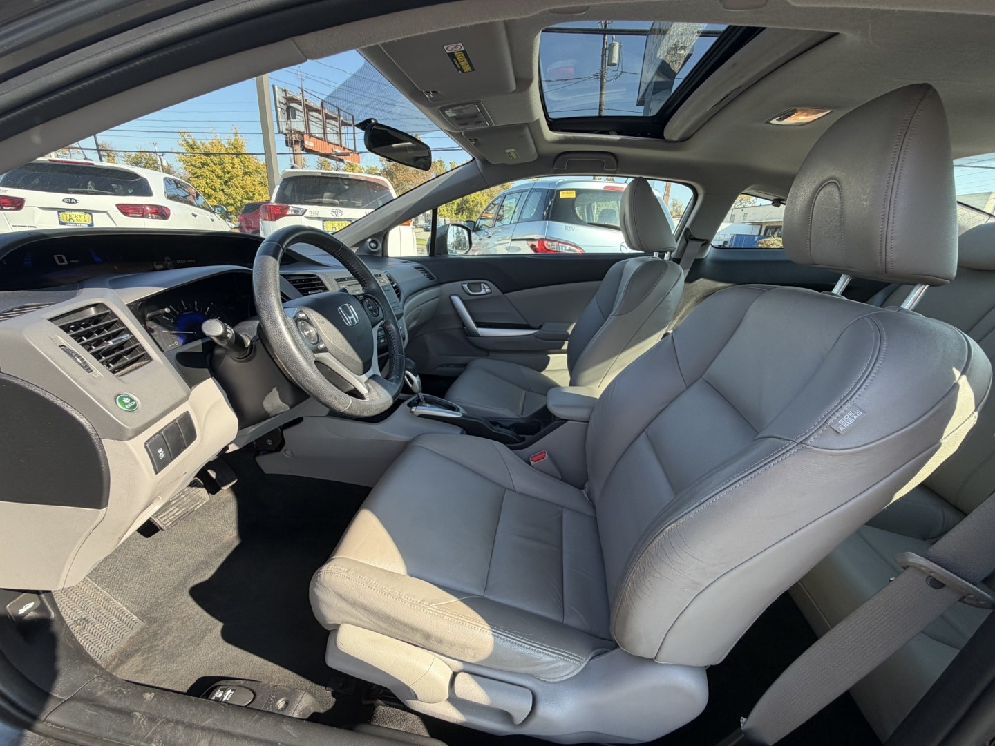 2012 SILVER Honda Civic EX-L Coupe 5-Spd AT (2HGFG3B05CH) with an 1.8L L4 SOHC 16V engine, 5A transmission, located at 1254 Manheim Pike, Lancaster, PA, 17601, (717) 393-9133, 40.062870, -76.323273- Photo#10