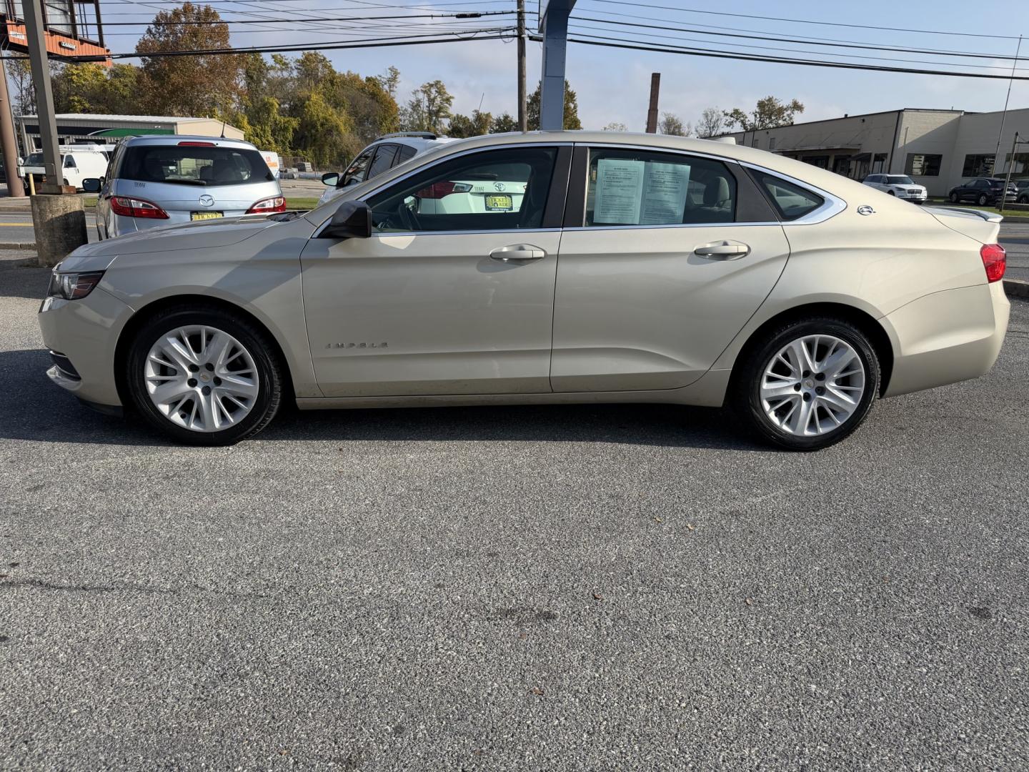 2014 GOLD Chevrolet Impala LS (2G11Y5SL3E9) with an 2.5L L4 DOHC 16V engine, 6-Speed Automatic transmission, located at 1254 Manheim Pike, Lancaster, PA, 17601, (717) 393-9133, 40.062870, -76.323273- Photo#1