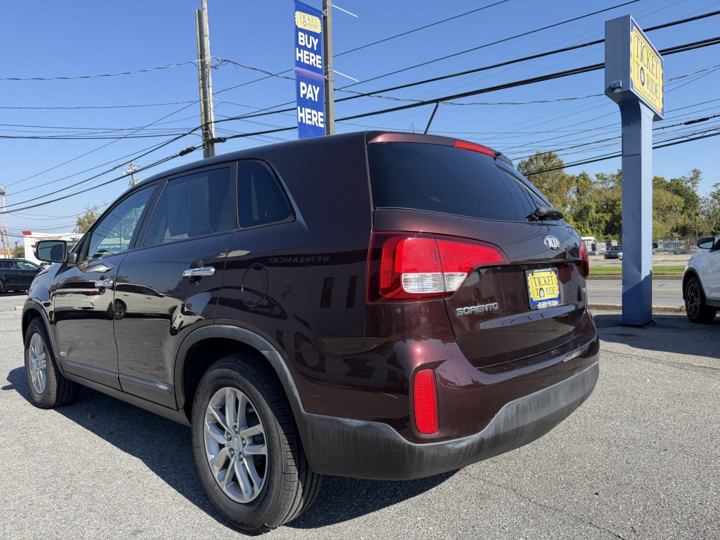 2015 MAROON Kia Sorento LX AWD (5XYKTCA6XFG) with an 2.4L L4 DOHC 16V engine, 6-Speed Automatic transmission, located at 1254 Manheim Pike, Lancaster, PA, 17601, (717) 393-9133, 40.062870, -76.323273 - Make room for your daily routine and weekend adventures in this 2015 Kia Sorento LX AWD! This versatile SUV offers a spacious interior and flexible cargo space for groceries, sports gear, or luggage. All-wheel drive adds traction when road conditions change, while its convenient four-door design mak- Photo#2